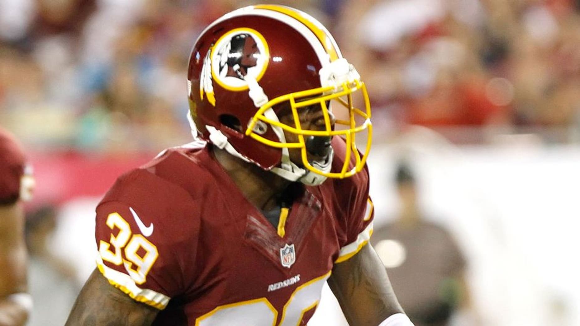 Aug 29, 2013; Tampa, FL, USA; Washington Redskins cornerback David Amerson (39) intercepts the ball during the first half against the Tampa Bay Buccaneers at Raymond James Stadium. Mandatory Credit: Kim Klement-USA TODAY Sports