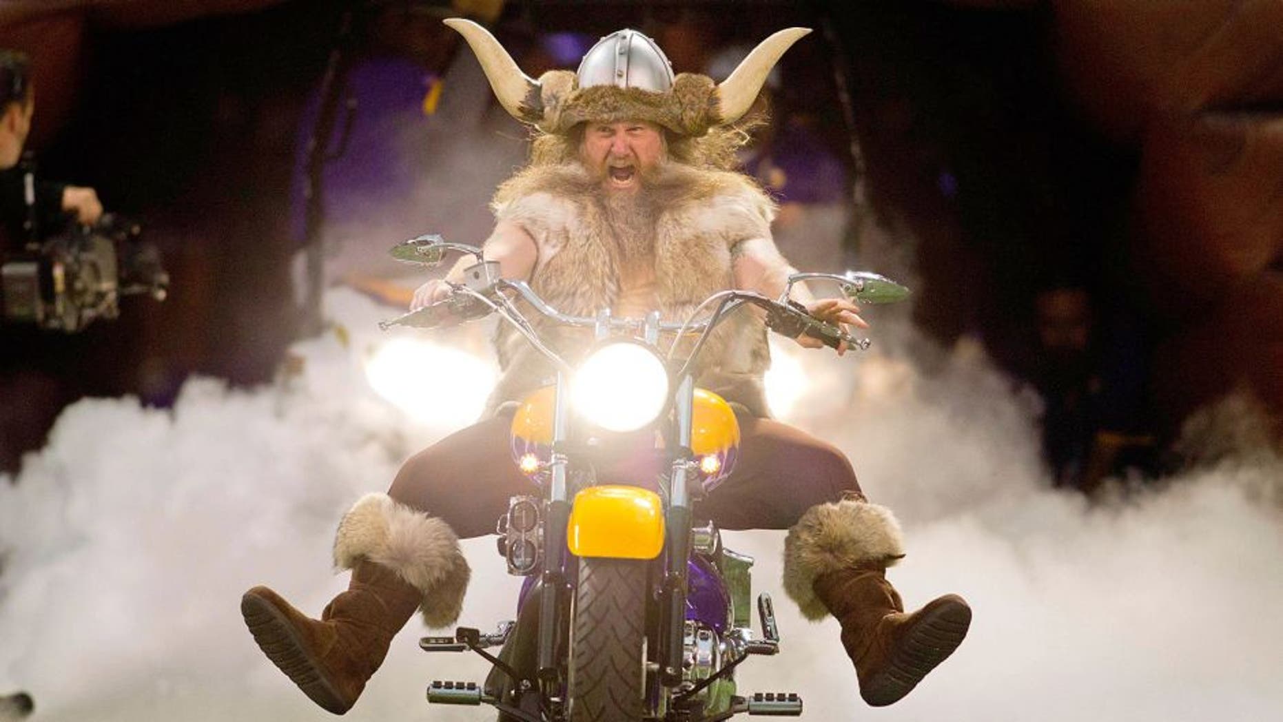 Dec 9, 2012; Minneapolis, MN, USA; Minnesota Vikings mascot Ragnar leads the team onto the field before the game with the Chicago Bears at the Metrodome. The Vikings win 24-14. Mandatory Credit: Bruce Kluckhohn-USA TODAY Sports