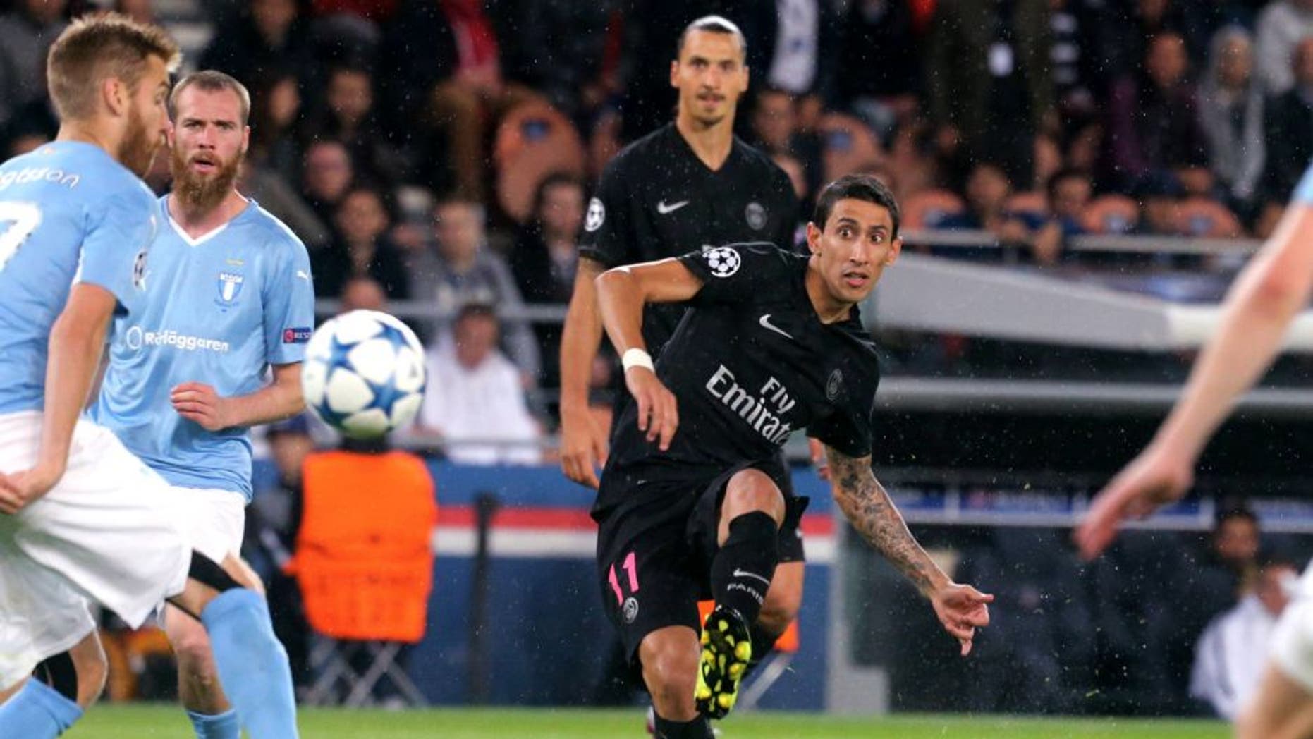 PARIS, FRANCE - SEPTEMBER 15: Angel Di Maria of Paris Saint-Germain in action with Zlatan Ibrahimovic during the UEFA Champions League between Paris Saint-Germain and Malmo FF at Parc Des Princes on September 15, 2015 in Paris, France. (Photo by Xavier Laine/Getty Images)