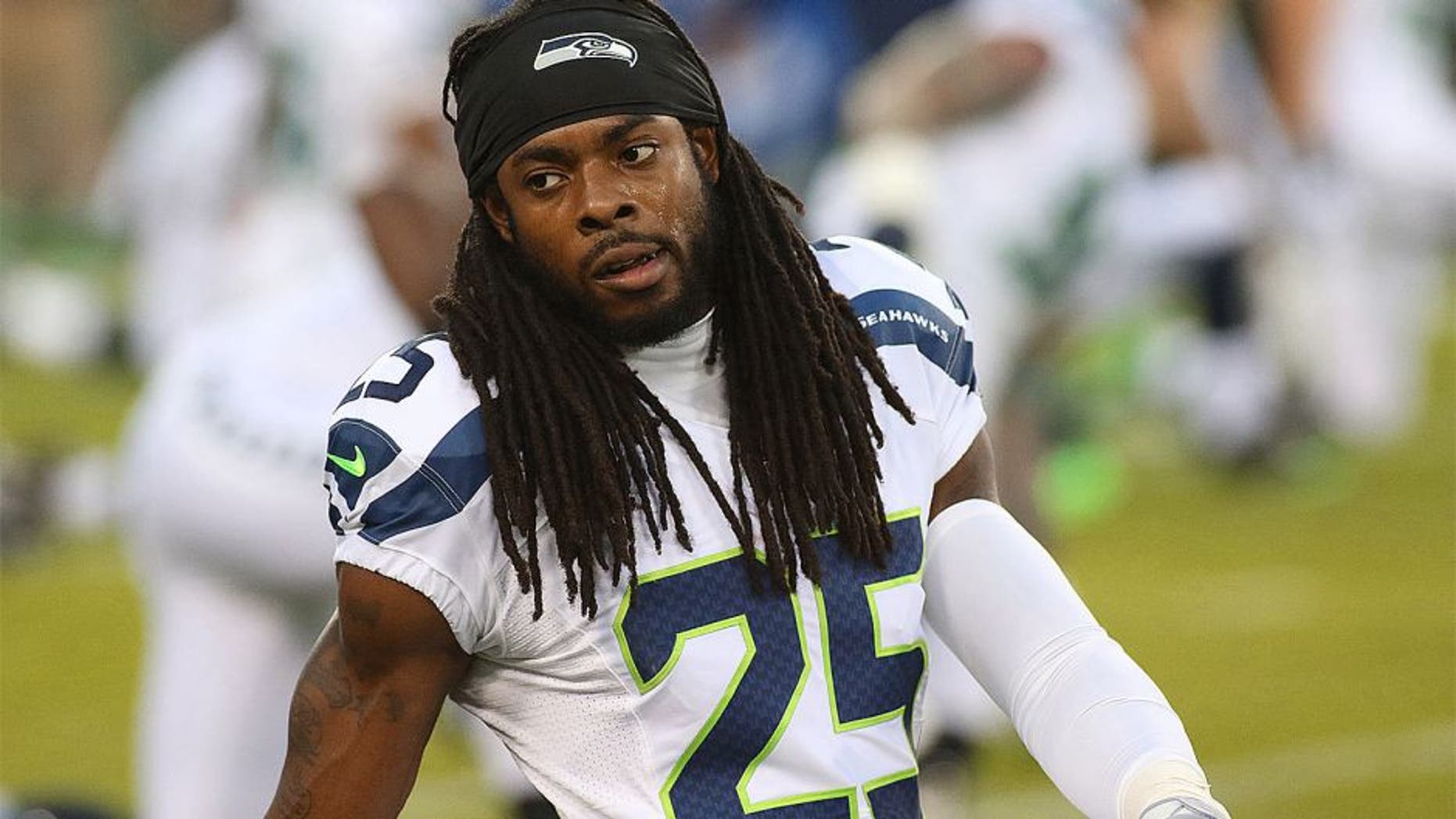 Sep 20, 2015; Green Bay, WI, USA; Seattle Seahawks cornerback Richard Sherman (25) warms up prior to a game against the Green Bay Packers at Lambeau Field. Mandatory Credit: Ray Carlin-USA TODAY Sports