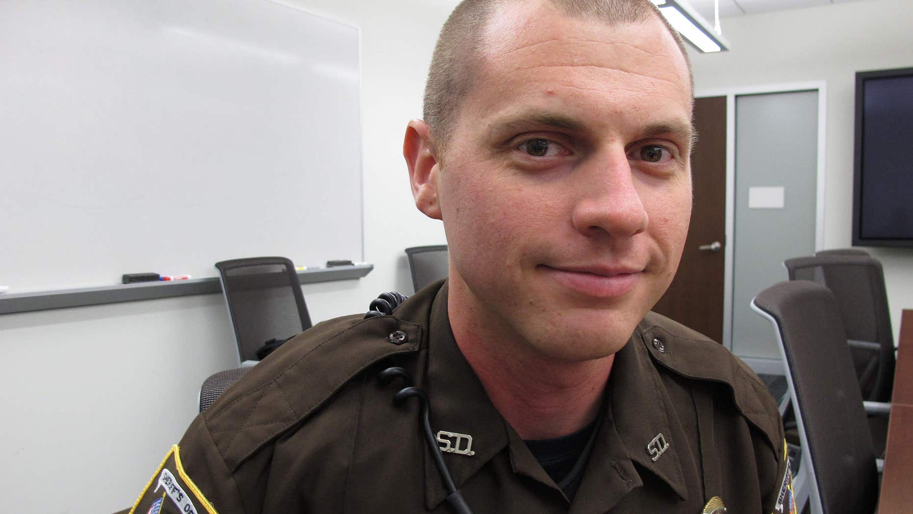 Sept. 22, 2015: Durham County Sheriff's Deputy David Earp speaks to reporters at headquarters in Durham, N.C.