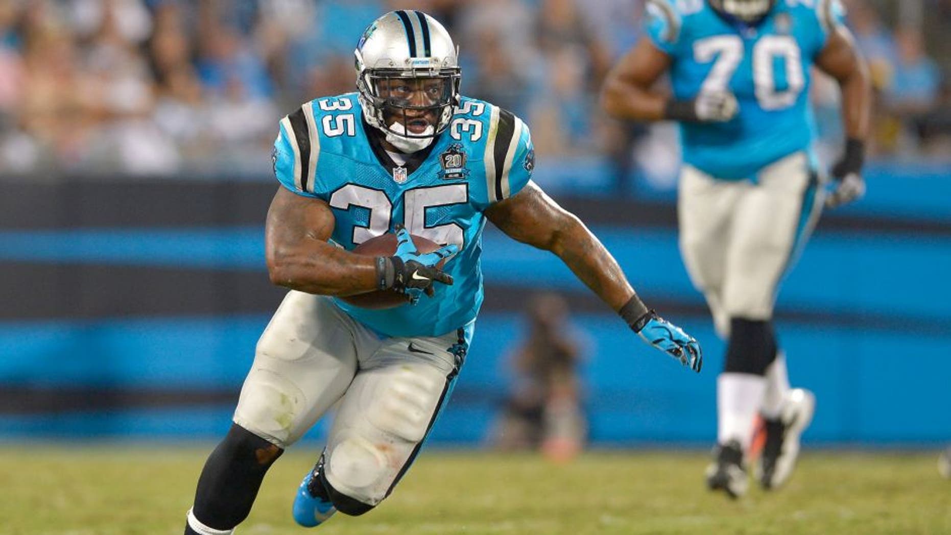 CHARLOTTE, NC - SEPTEMBER 21: Mike Tolbert #35 of the Carolina Panthers runs against the Pittsburgh Steelers during their game at Bank of America Stadium on September 21, 2014 in Charlotte, North Carolina. The Steelers won 37-19. (Photo by Grant Halverson/Getty Images) *** Local Caption *** Mike Tolbert