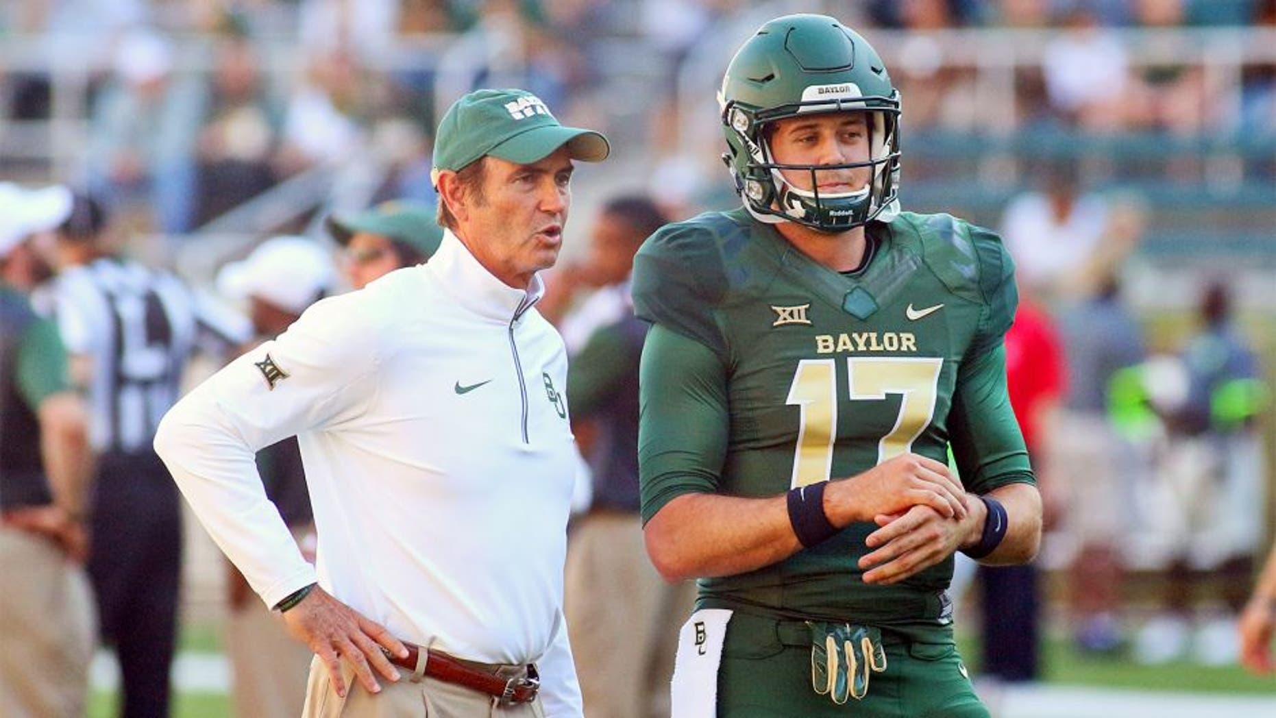 Sep 12, 2015; Waco, TX, USA; Baylor Bears head coach Art Briles and quarterback Seth Russell (17) prior to a game against the Lamar Cardinals at McLane Stadium. Baylor 66-31. Mandatory Credit: Ray Carlin-USA TODAY Sports