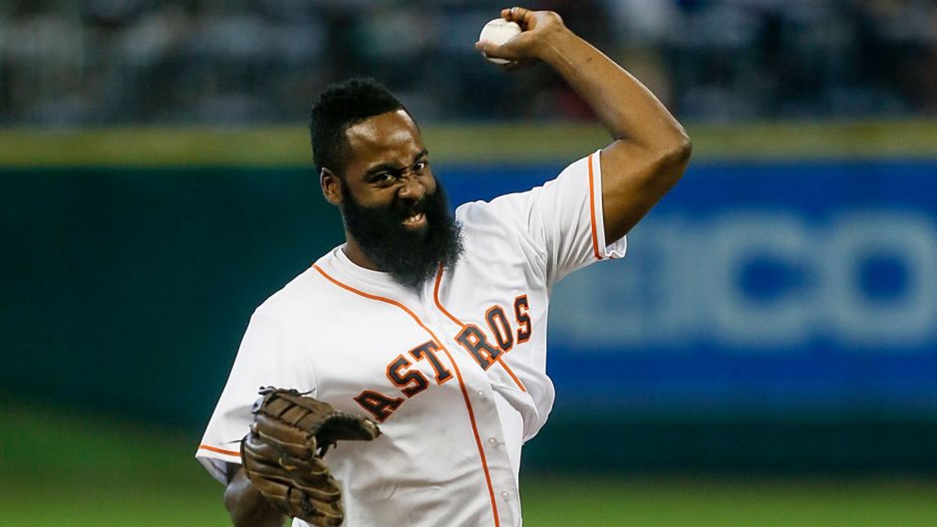 HOUSTON, TX - SEPTEMBER 23: James Harden of the Houston Rockets throws out the first pitch before the Houston Astros play the Los Angeles Angels of Anaheim at Minute Maid Park on September 23, 2015 in Houston, Texas. (Photo by Bob Levey/Getty Images)