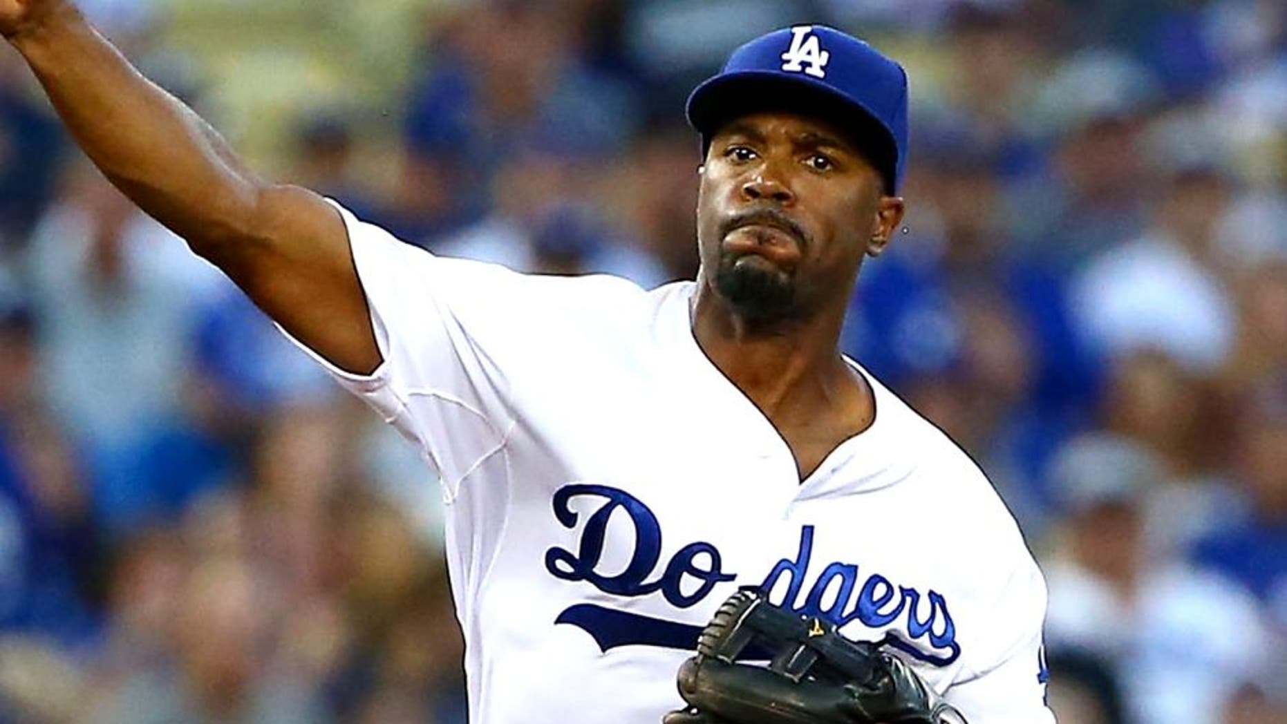 LOS ANGELES, CA - AUGUST 29: Jimmy Rollins #11 of the Los Angeles Dodgers fields a throw to first base for the second out of the fourth inning during the MLB game against the Chicago Cubs at Dodger Stadium on August 29, 2015 in Los Angeles, California. The Dodgers defeated the Cubs 5-2. (Photo by Victor Decolongon/Getty Images)