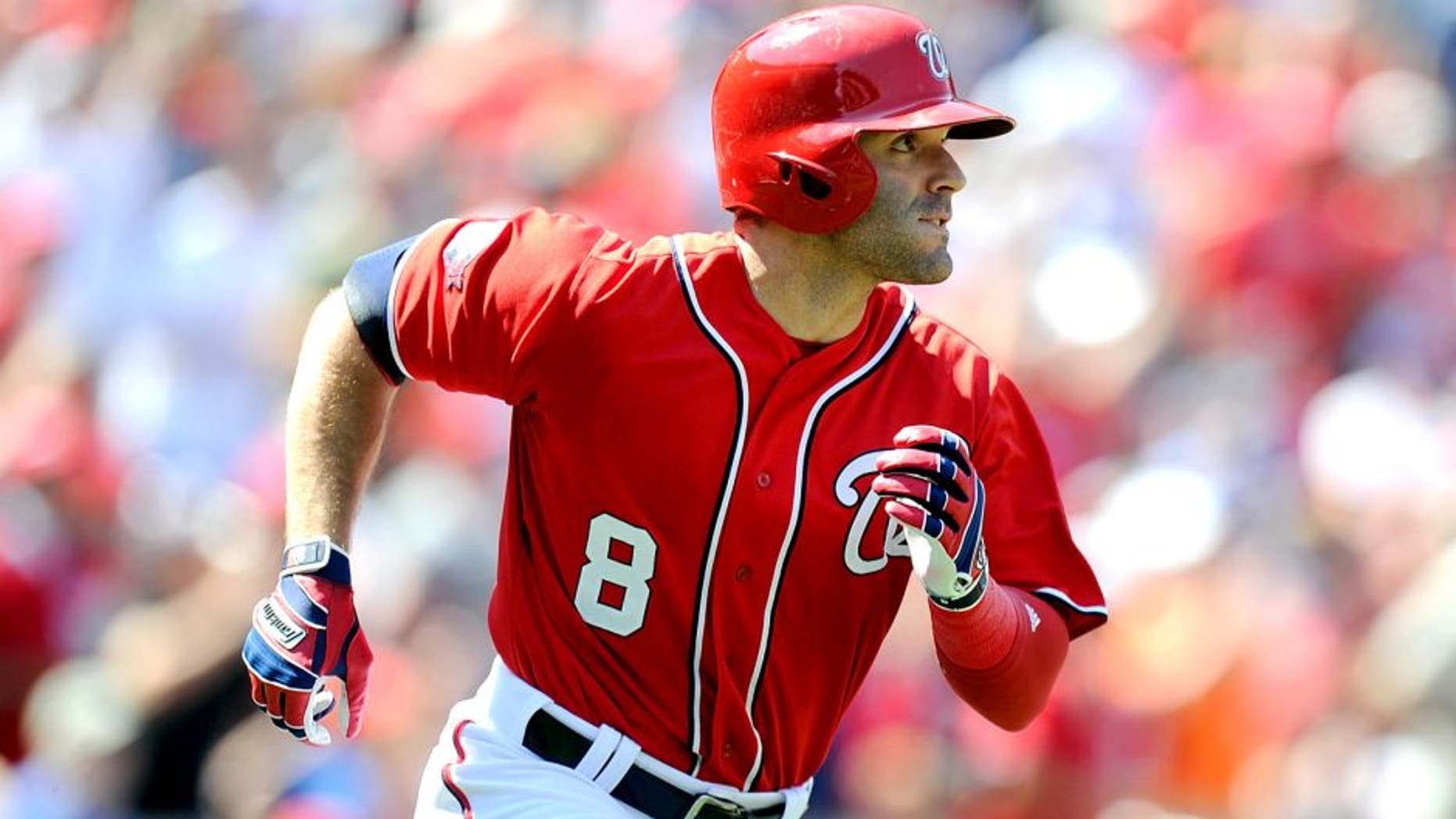 WASHINGTON, DC - AUGUST 23: Danny Espinosa #8 of the Washington Nationals watches his three-run double in the third inning against the Milwaukee Brewers at Nationals Park on August 23, 2015 in Washington, DC. (Photo by Greg Fiume/Getty Images)