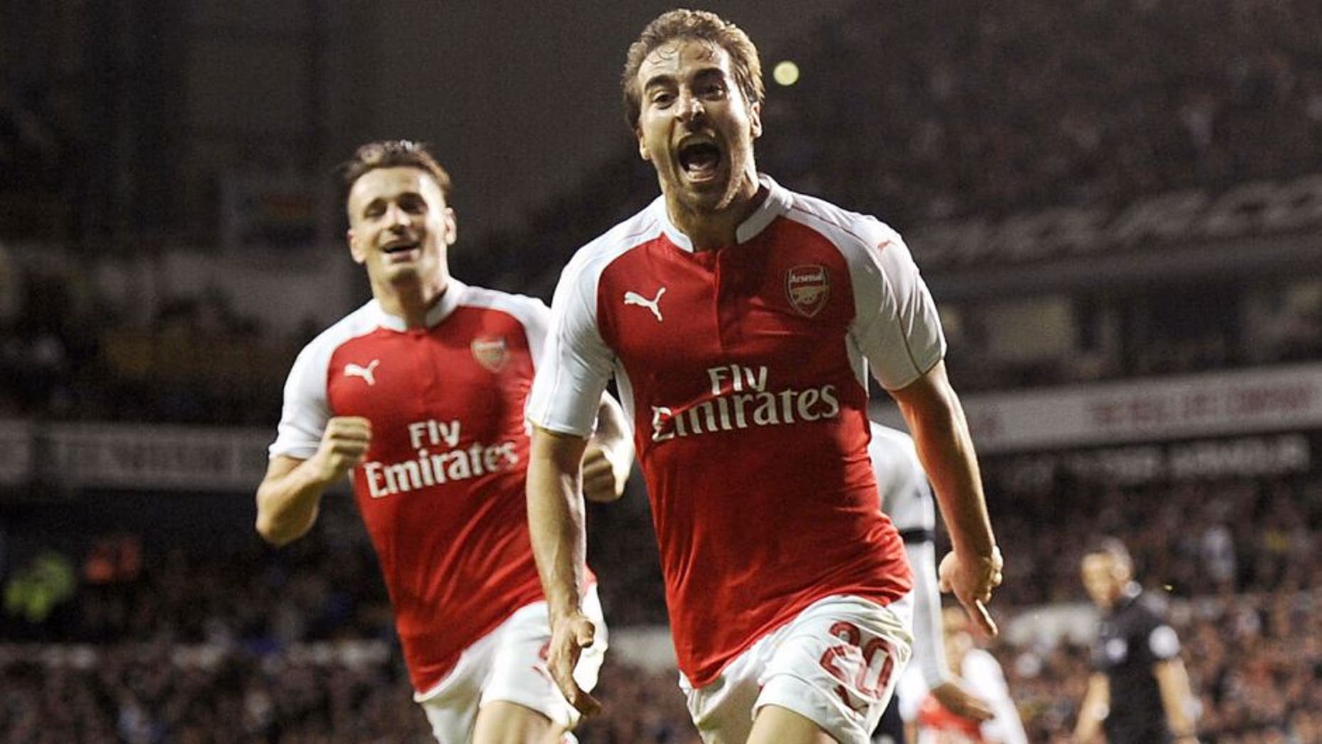 LONDON, ENGLAND - SEPTEMBER 23: Mathieu Flamini scores the 2nd Arsenal goal during the Capital One Cup Third Round match between Tottenham Hotspur and Arsenal at White Hart Lane on September 23, 2015 in London, England. (Photo by Stuart MacFarlane/Arsenal FC via Getty Images)
