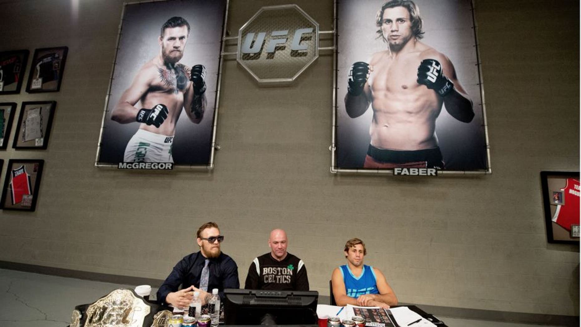 LAS VEGAS, NV - JULY 17: (L-R) Conor McGregor, UFC president Dana White, and Urijah Faber watch the elimination fights at the UFC TUF Gym on July 17, 2015 in Las Vegas, Nevada. (Photo by Brandon Magnus/Zuffa LLC/Zuffa LLC via Getty Images)