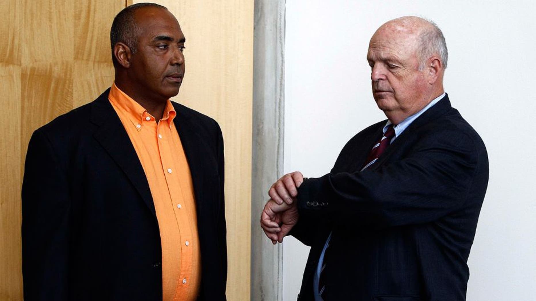 Jul 26, 2011; Cincinnati, OH, USA; Cincinnati Bengals head coach Marvin Lewis (left) and owner Mike Brown (right) talk before their press conference at Paul Brown Stadium. Mandatory Credit: Frank Victores-USA TODAY Sports