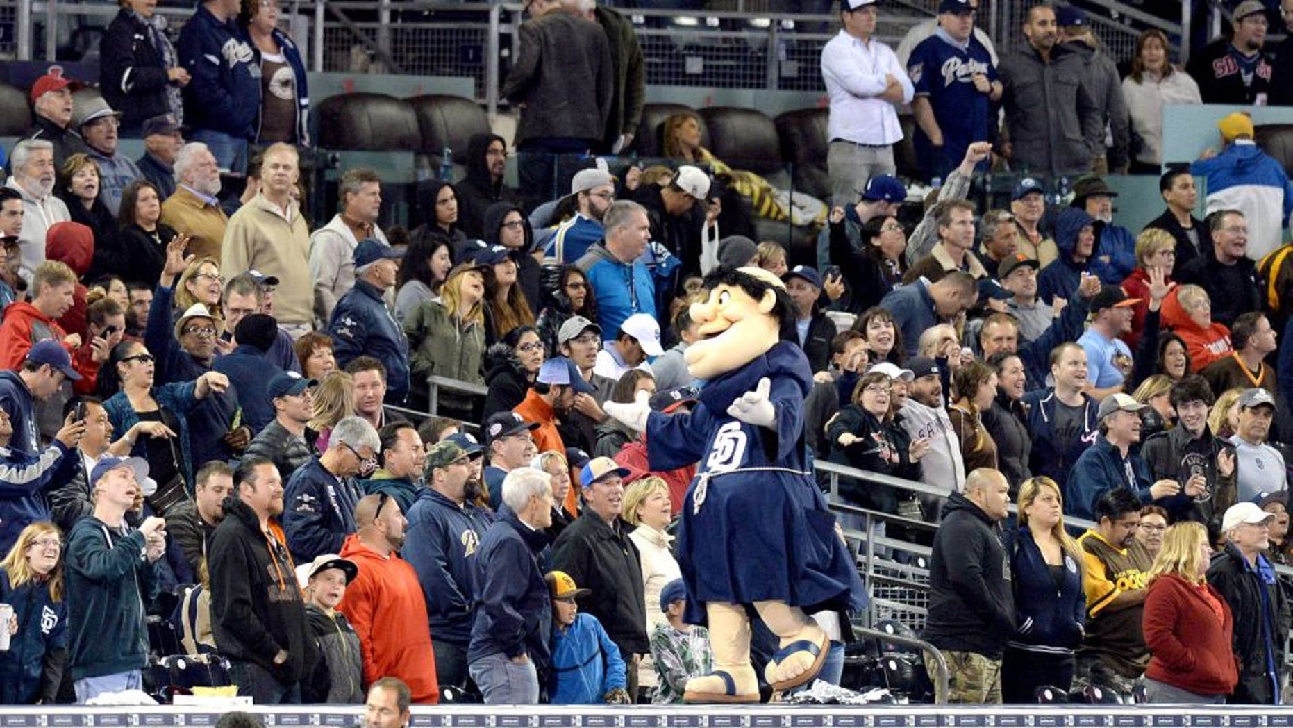 May 15, 2015; San Diego, CA, USA; The San Diego Padres mascot The Swingin Friar leads the crowd in "Take Me Out to the Ball Game" during the seventh inning against the Washington Nationals at Petco Park. Mandatory Credit: Jake Roth-USA TODAY Sports