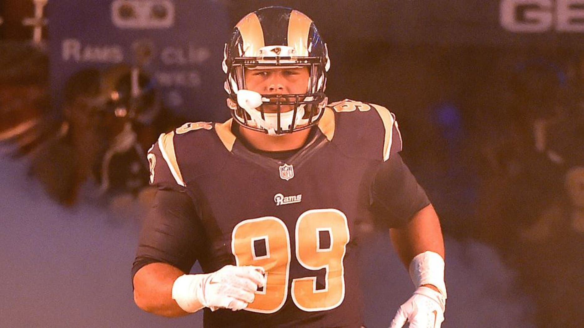 Sep 13, 2015; St. Louis, MO, USA; St. Louis Rams defensive tackle Aaron Donald (99) runs on to the field before the game between the St. Louis Rams and the Seattle Seahawks during the first half at the Edward Jones Dome. Mandatory Credit: Jasen Vinlove-USA TODAY Sports