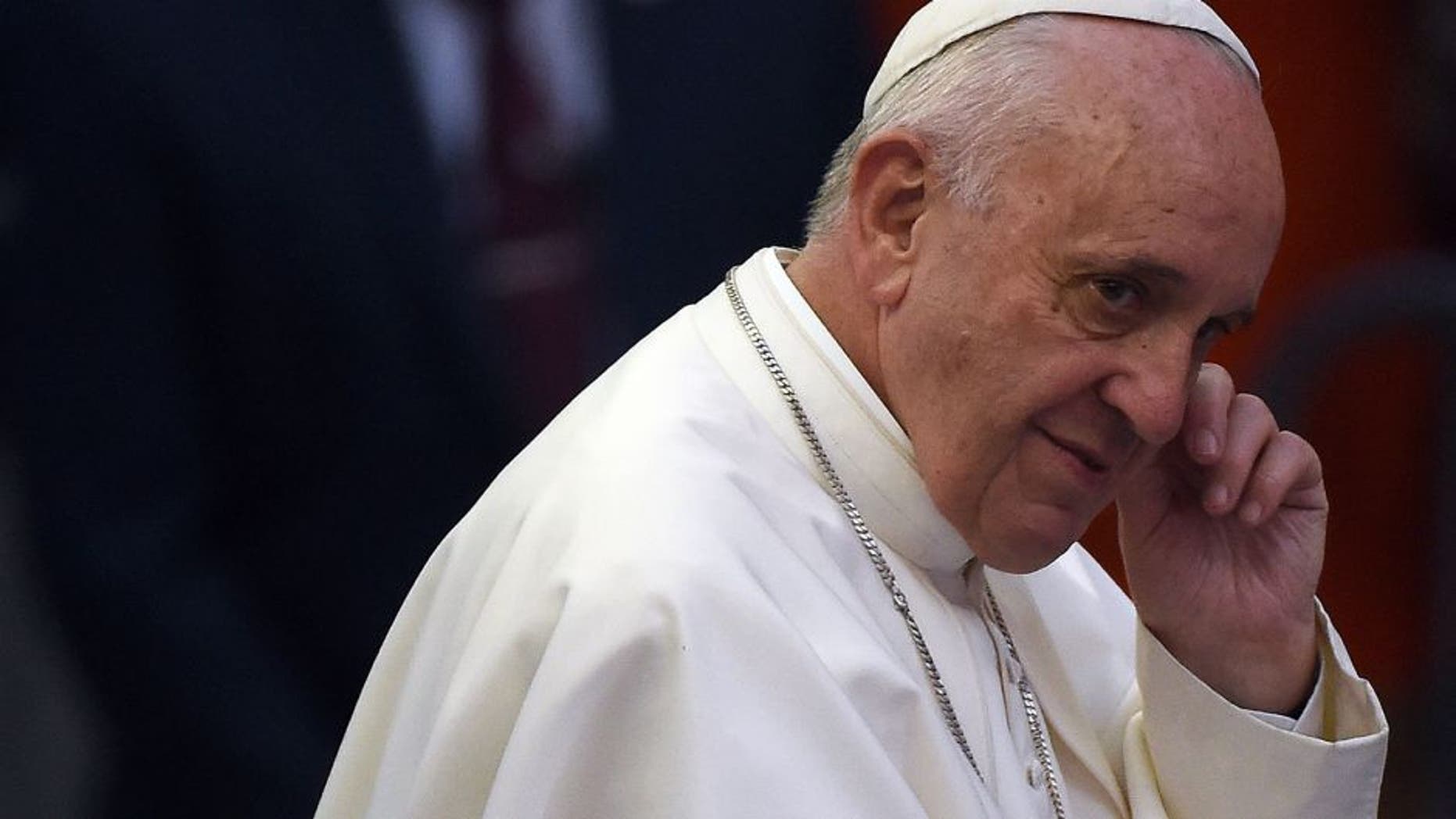 Pope Francis gestures as he arrives at the St Patrick's Cathedral to lead evening prayers in New York on September 24, 2015. Pope Francis arrived in New York on the second leg of his US tour where he will address the UN General Assembly, visit the 9/11 Memorial and celebrate mass at Madison Square Garden. AFP PHOTO/JEWEL SAMAD (Photo credit should read JEWEL SAMAD/AFP/Getty Images)