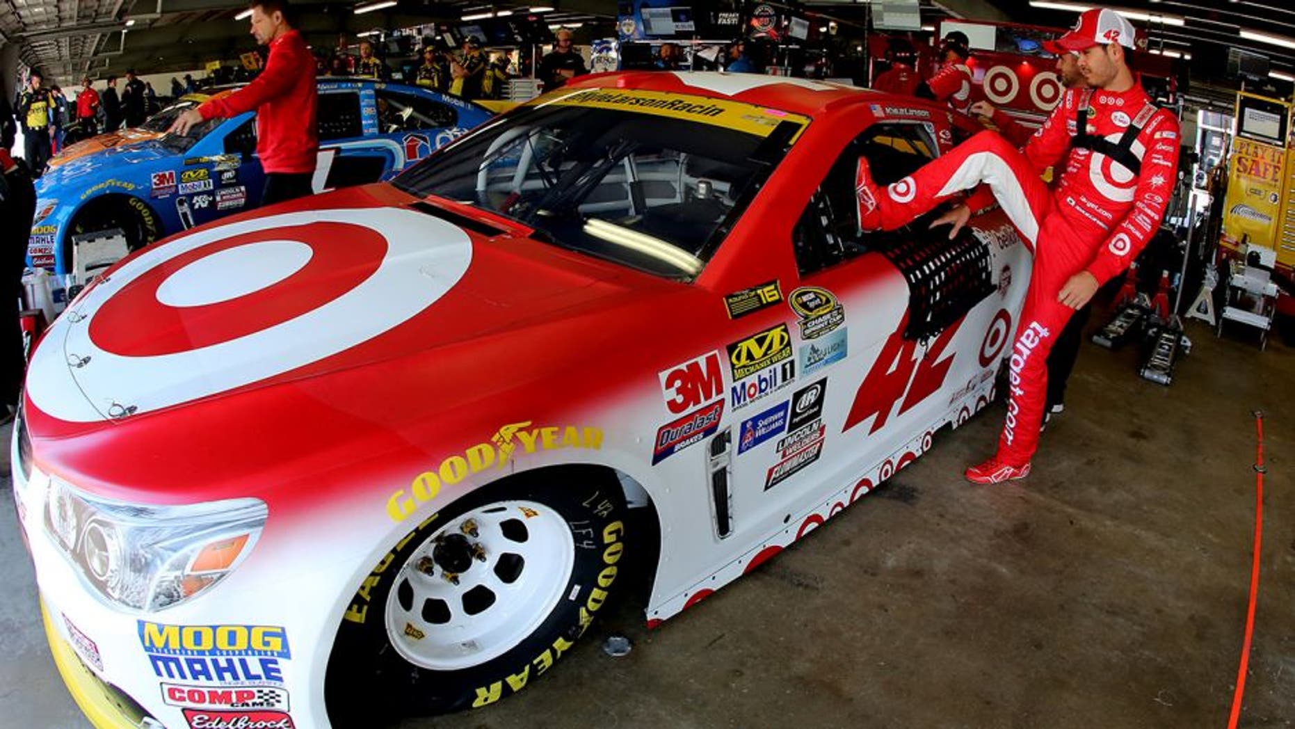 LOUDON, NH - SEPTEMBER 24: Kyle Larson, driver of the #42 Target Chevrolet, climbs into his car during practice for the NASCAR Sprint Cup Series Bad Boy Off Road 300 at New Hampshire Motor Speedway on September 24, 2016 in Loudon, New Hampshire. (Photo by Jerry Markland/Getty Images)