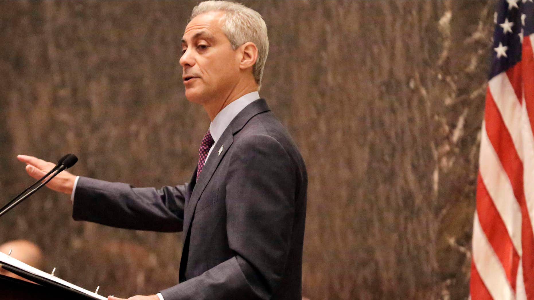 FILE - In this Sept. 22, 2015, file photo, Chicago Mayor Rahm Emanuel outlines his 2016 proposed budget before the City Council in Chicago.
