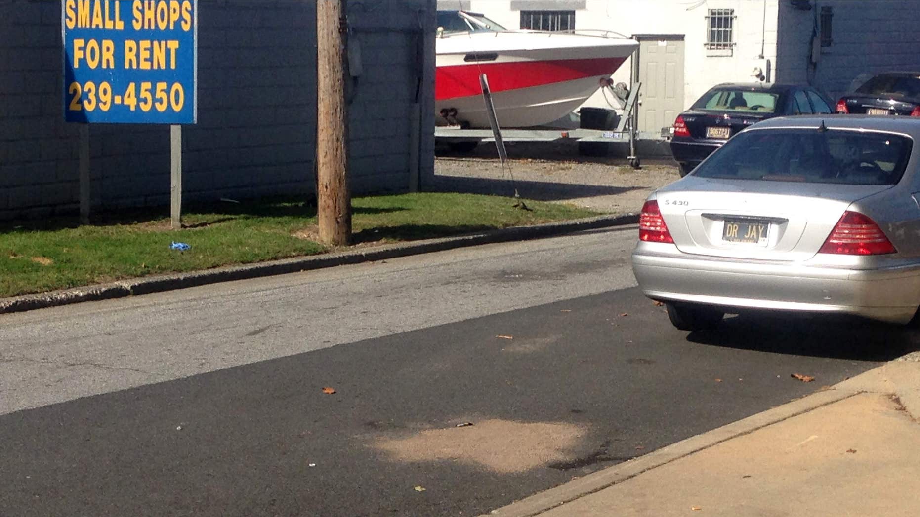 Sept. 24, 2015: The scene of where Delaware police officers fatally shot an armed man in wheelchair after responding to a call that he had a self-inflicted gunshot wound, is seen in Wilmington, Del.