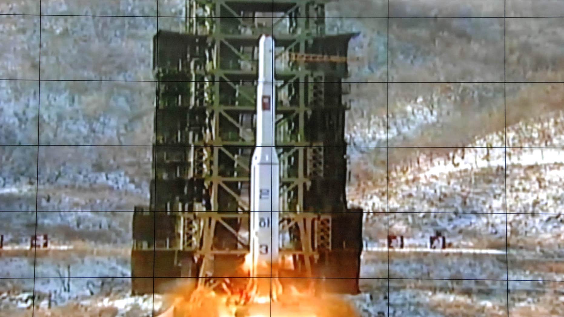 FILE - In this Dec. 12, 2012 file photo, a screen at the General Satellite Control and Command Center shows the moment North Korea's Unha-3 rocket is launched in Pyongyang, North Korea.