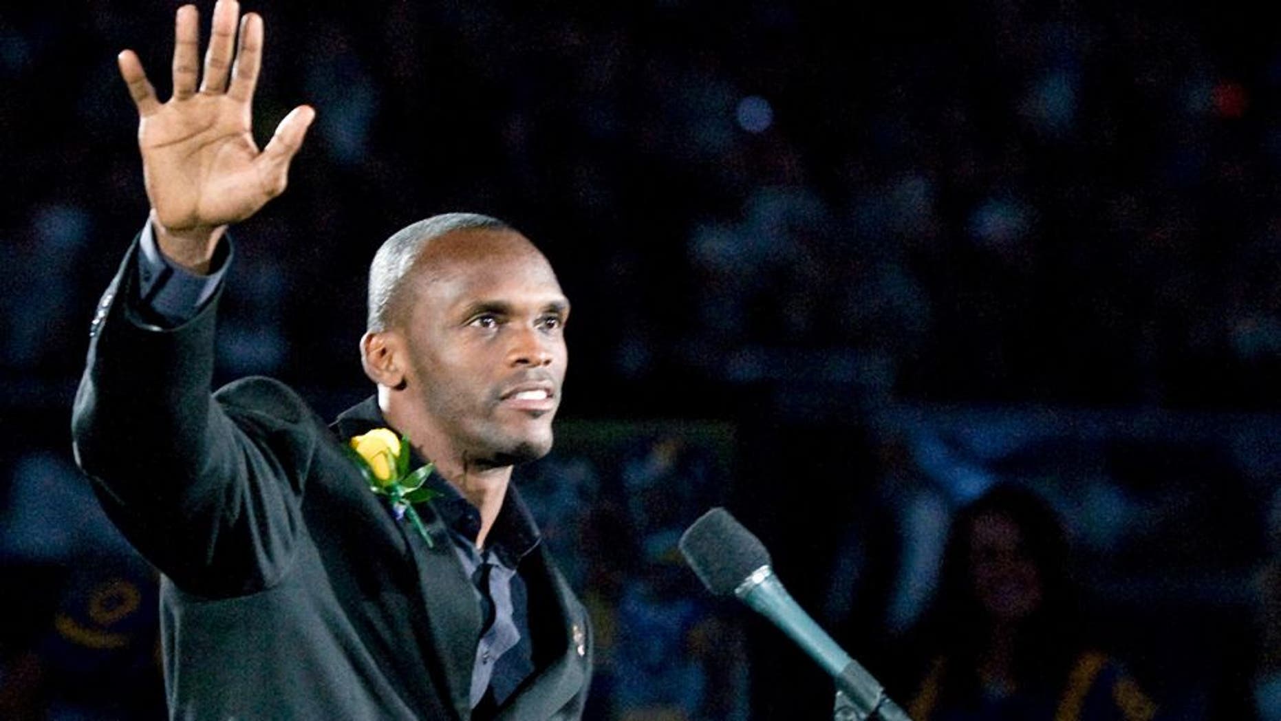 October 31, 2010; St. Louis, MO, USA; St. Louis Rams former wide receiver Isaac Bruce (80) waves to fans during a ceremony to retire his number before a game against the Carolina Panthers at the Edward Jones Dome. Mandatory Credit: Jeff Curry-USA TODAY Sports
