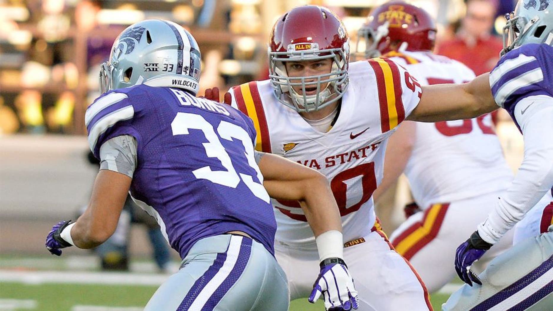 Nov 2, 2013; Manhattan, KS, USA; Iowa State Cyclones defensive lineman Mitchell Meyers (90) blocks Kansas State Wildcats defensive back Morgan Burns (33) during the second half at Bill Snyder Family Stadium. The Wildcats defeat the Cyclones 41-7. Mandatory Credit: Jasen Vinlove-USA TODAY Sports