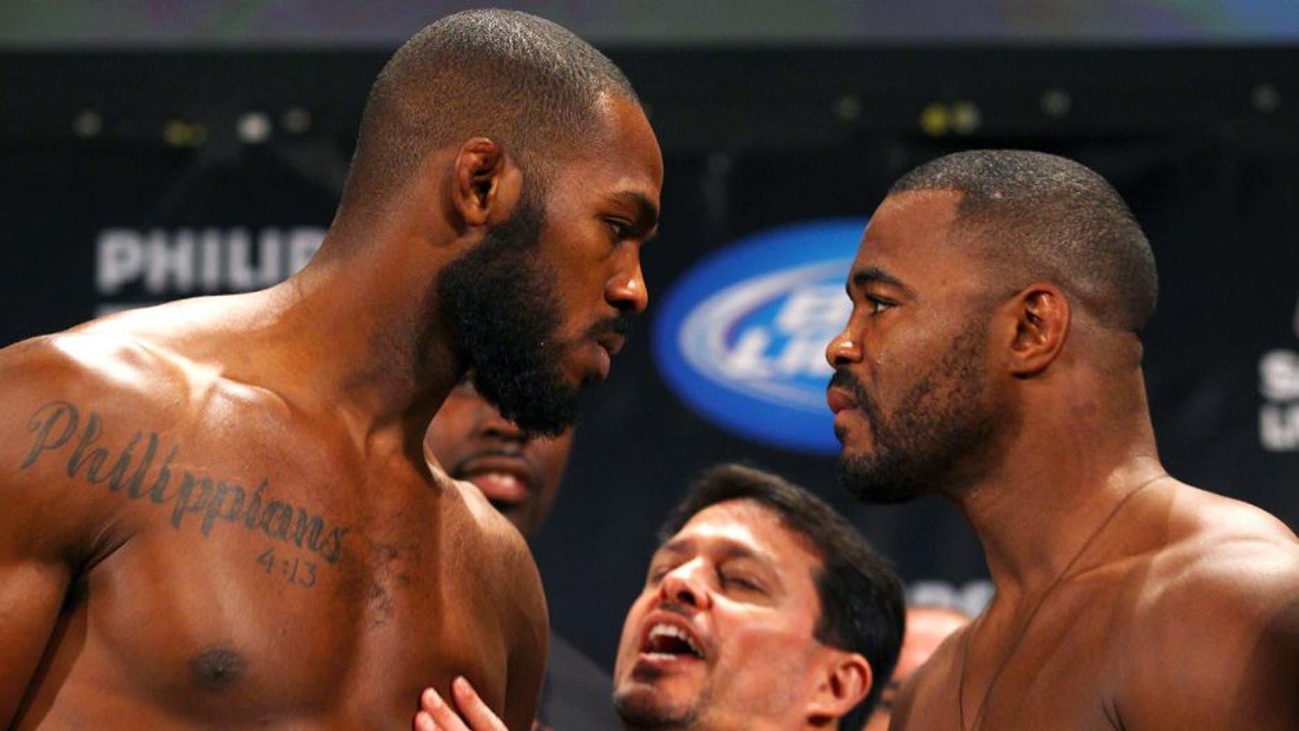 ATLANTA, GA - APRIL 20: Jon Jones (L) and Rashad Evans face off during the UFC 145 official weigh in at Fox Theatre on April 20, 2012 in Atlanta, Georgia. (Photo by Al Bello/Zuffa LLC/Zuffa LLC via Getty Images)