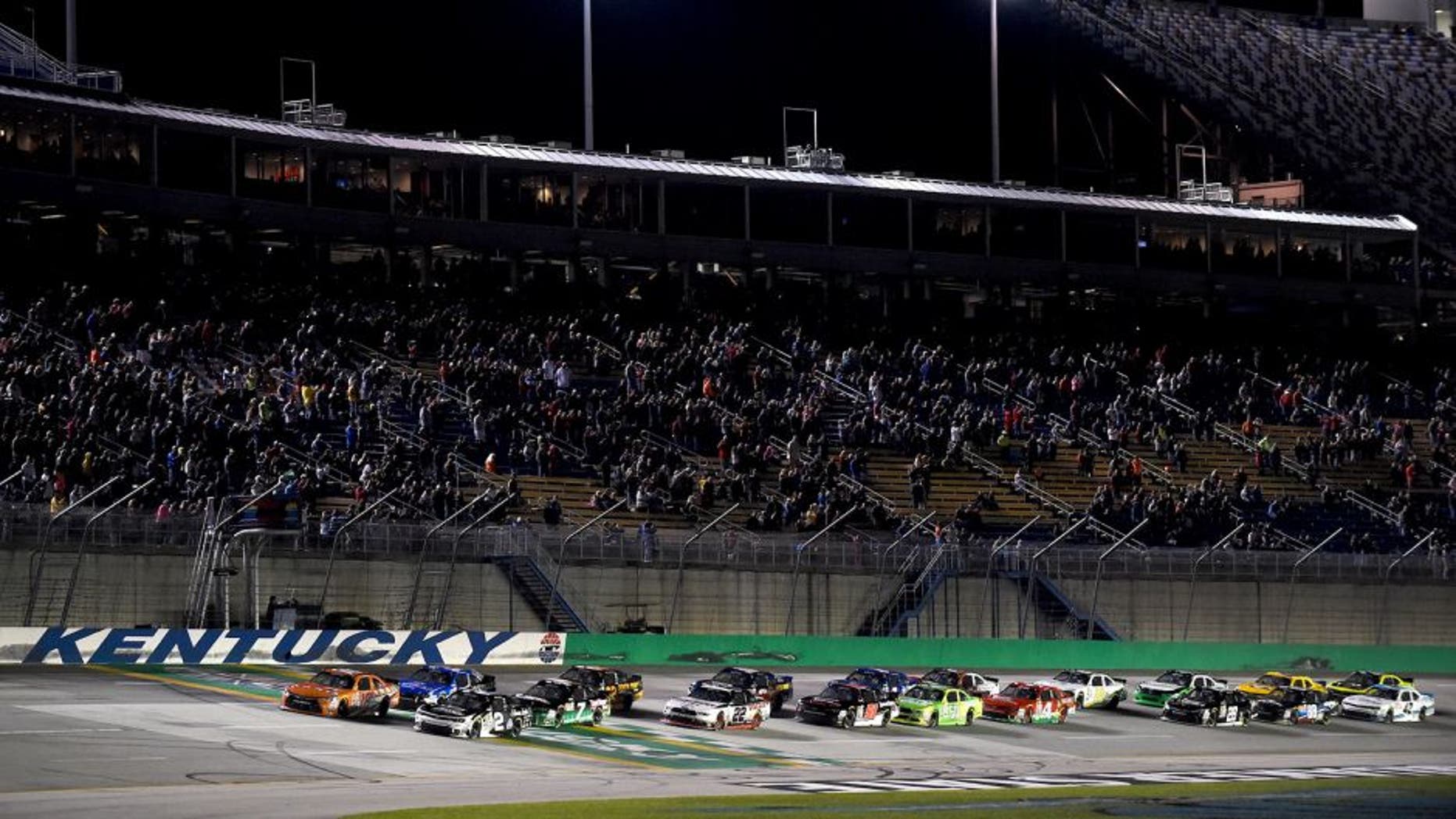 SPARTA, KY - SEPTEMBER 26: Daniel Suarez, driver of the #18 ARRIS Toyota, and Brian Scott, driver of the #2 Shore Lodge Chevrolet, lead the field to the green flag at the start of the NASCAR Xfinity Series Visitmyrtlebeach.com 300 at Kentucky Speedway on September 26, 2015 in Sparta, Kentucky. (Photo by Rainier Ehrhardt/NASCAR via Getty Images)