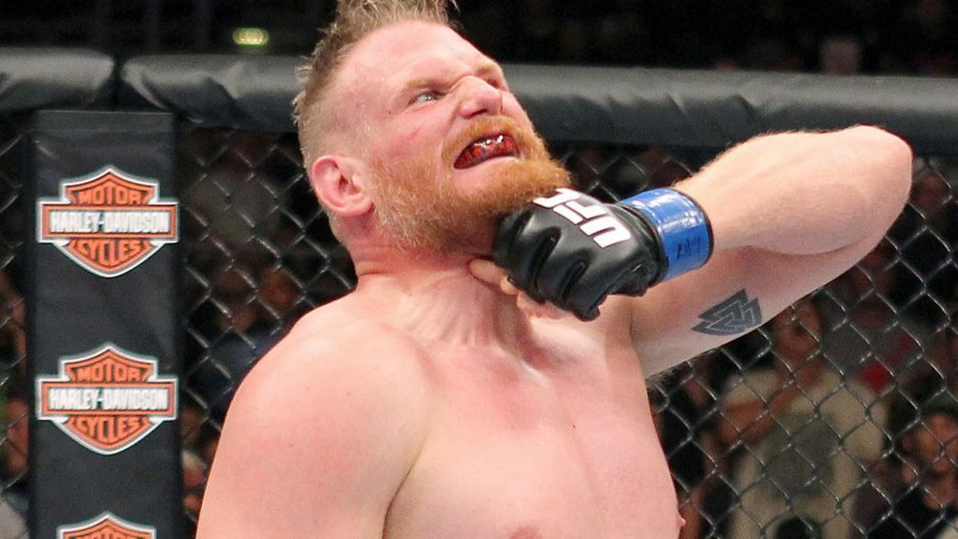 MILWAUKEE, WI - AUGUST 31: Josh Barnett celebrates after defeating Frank Mir in their UFC heavyweight bout at BMO Harris Bradley Center on August 31, 2013 in Milwaukee, Wisconsin. (Photo by Ed Mulholland/Zuffa LLC/Zuffa LLC via Getty Images)