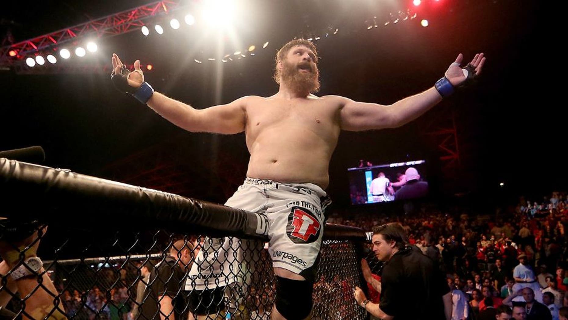 ABU DHABI, UNITED ARAB EMIRATES - APRIL 11: Roy Nelson celebrates his knockout victory against Antonio Rodrigo Nogueira in their heavyweight bout during UFC Fight Night 39 at du Arena on April 11, 2014 in Abu Dhabi, United Arab Emirates. (Photo by Warren Little/Zuffa LLC/Zuffa LLC via Getty Images)