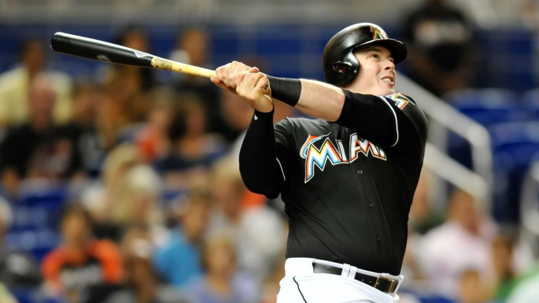 Sep 26, 2015; Miami, FL, USA; Miami Marlins first baseman Justin Bour (48) connects for a two run home run during the first inning against the Atlanta Braves at Marlins Park. Mandatory Credit: Steve Mitchell-USA TODAY Sports