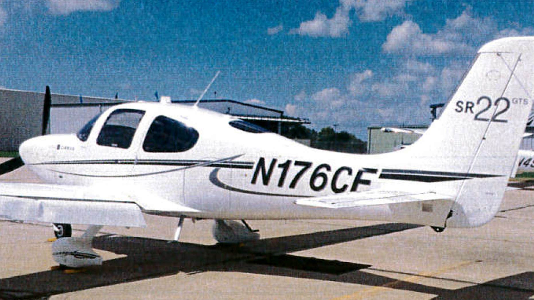 This undated photo provided by the Bloomington Normal Airport Authority shows a damaged wing of a Cirrus SR22 single engine plane at the Central Illinois Regional Airport in Bloomington, Ill.