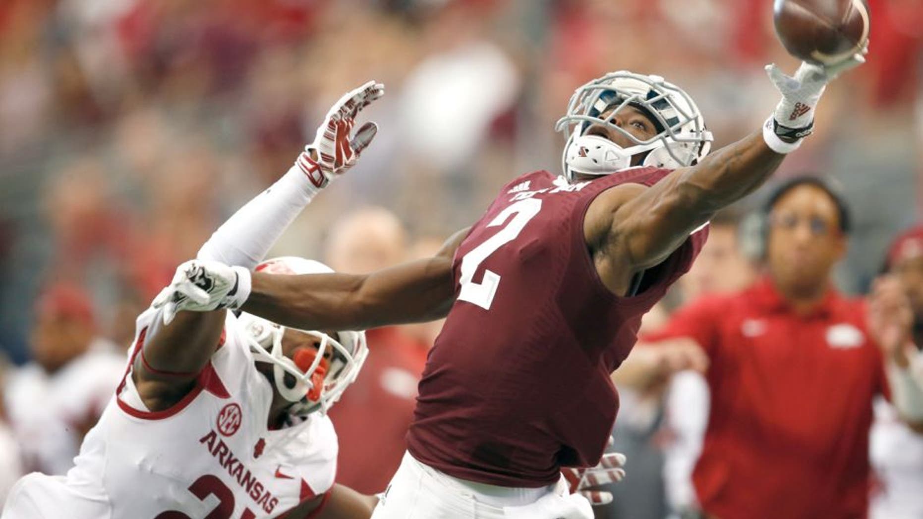 Sep 27, 2014; Arlington, TX, USA; Texas A&M Aggies receiver Speedy Noil (2) can not make the catch against Arkansas Razorbacks cornerback Carroll Washington (21) at AT&T Stadium. Mandatory Credit: Matthew Emmons-USA TODAY Sports