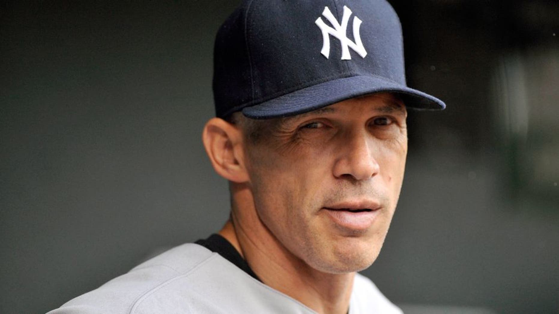 Sep 13, 2014; Baltimore, MD, USA; New York Yankees manager Joe Girardi (28) during a game against the Baltimore Orioles at Oriole Park at Camden Yards. Mandatory Credit: Joy R. Absalon-USA TODAY Sports