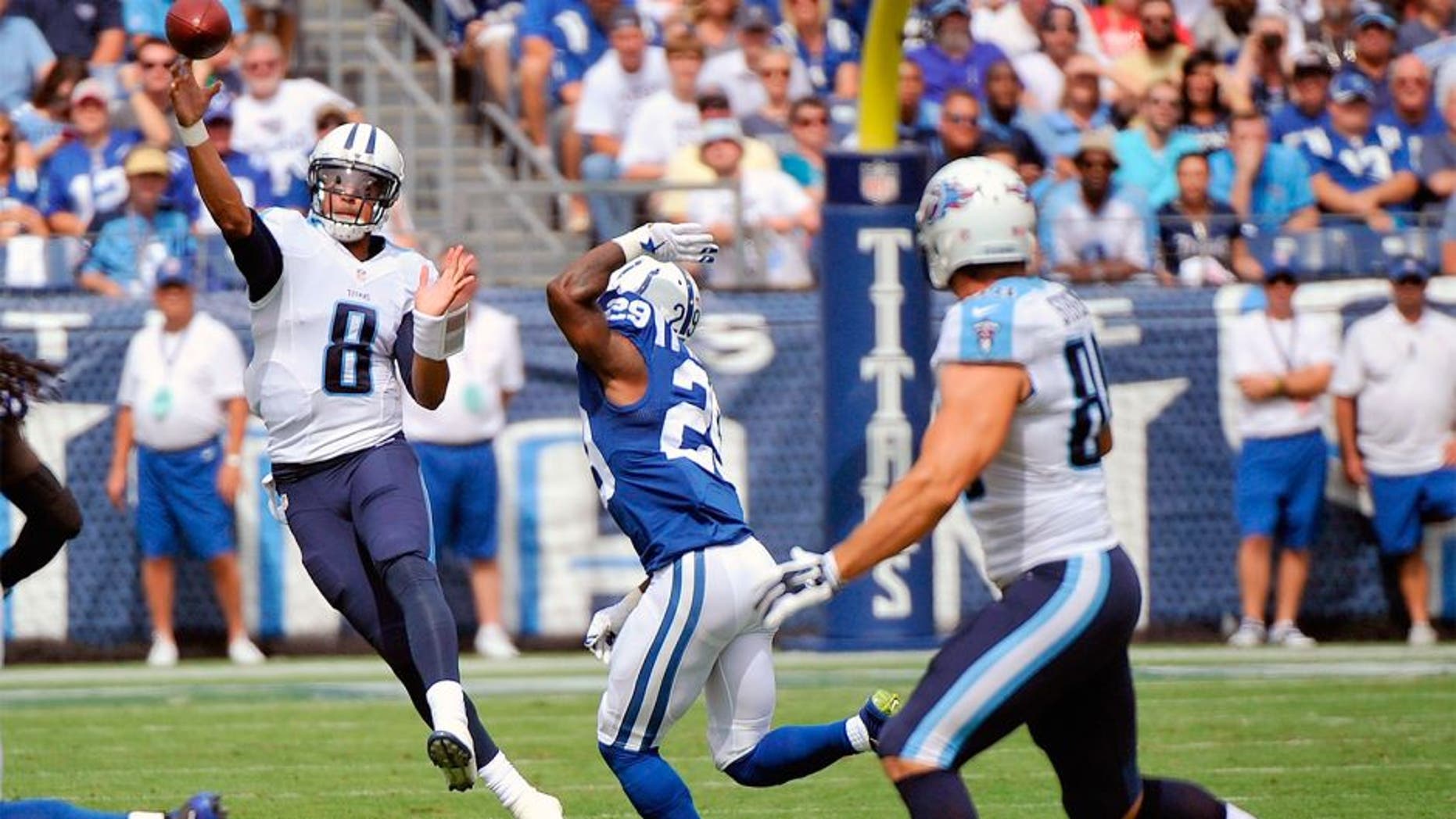 NASHVILLE, TN - SEPTEMBER 27: Quarterback Marcus Mariota #8 of the Tennessee Titans drops back to throw a pass to Craig Stevens #88 against the Indianapolis Colts at Nissan Stadium on September 27, 2015 in Nashville, Tennessee. (Photo by Frederick Breedon/Getty Images)
