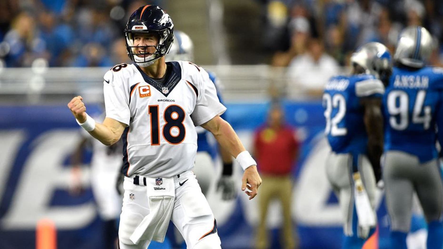 DETROIT, MI - SEPTEMBER 27: Denver Broncos quarterback Peyton Manning #18 celebrates his pass to wide receiver Demaryius Thomas #88 that he will turn into a touchdown at the end of the first half vs the Detroit Lions at Ford Field in Detroit, Mi, September 27, 2015 (Photo By Joe Amon/The Denver Post via Getty Images)
