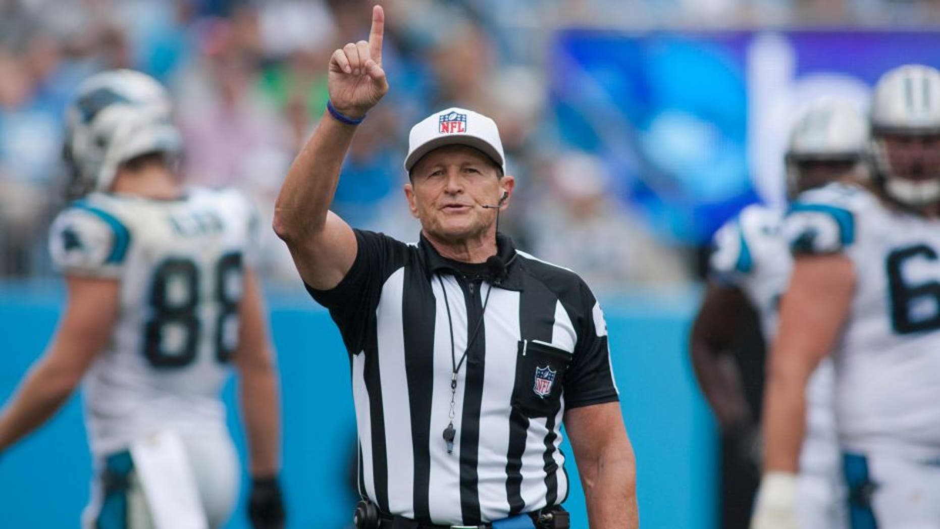 Sep 27, 2015; Charlotte, NC, USA; Referee Ed Hochuli signals first down during the third quarter in the game between the Carolina Panthers and the New Orleans Saints at Bank of America Stadium. Carolina defeated the Saints 27-22. Mandatory Credit: Jeremy Brevard-USA TODAY Sports