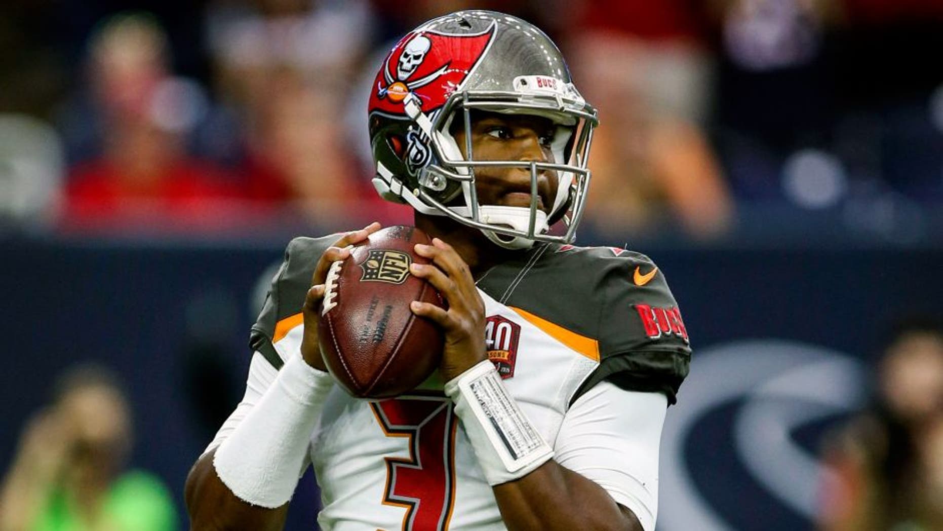 Sep 27, 2015; Houston, TX, USA; Tampa Bay Buccaneers quarterback Jameis Winston (3) looks for an open receiver during the first quarter against the Houston Texans at NRG Stadium. Mandatory Credit: Troy Taormina-USA TODAY Sports