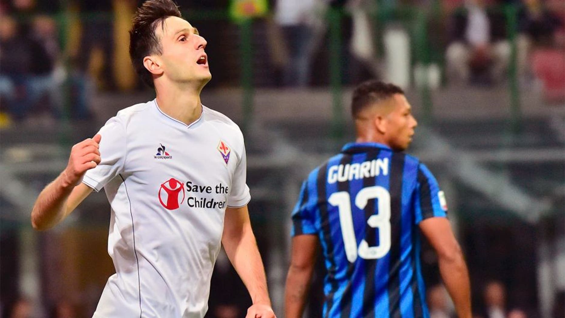Fiorentina's Croatian forward Nikola Kalinic celebrates after scoring a goal during the Serie A football match between Inter Milan and Fiorentina at the San Siro Stadium in Milan on September 27, 2015 . AFP PHOTO / GIUSEPPE CACACE (Photo credit should read GIUSEPPE CACACE/AFP/Getty Images)