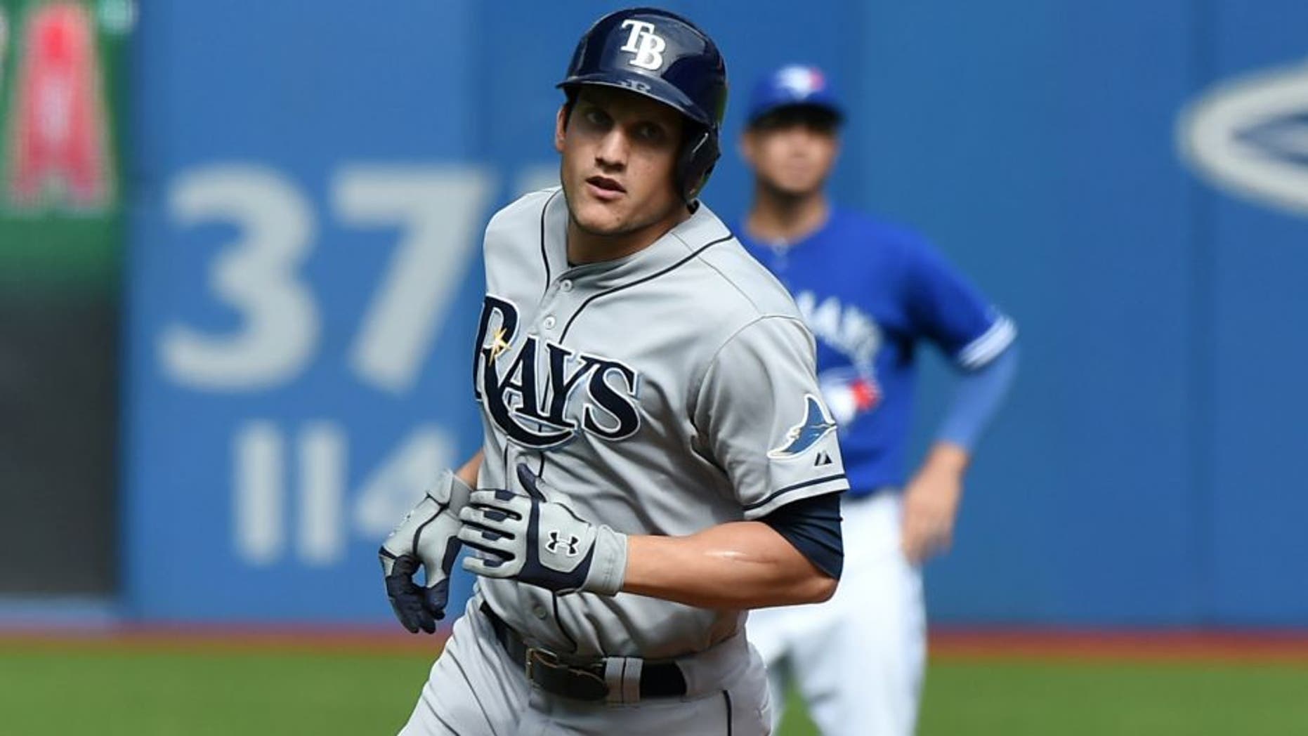 Sep 27, 2015; Toronto, Ontario, CAN; Tampa Bay Rays center fielder Mikie Mahtook (27) rounds the bases after hitting a two-run home run against Toronto Blue Jays in the third inning at Rogers Centre. Mandatory Credit: Dan Hamilton-USA TODAY Sports