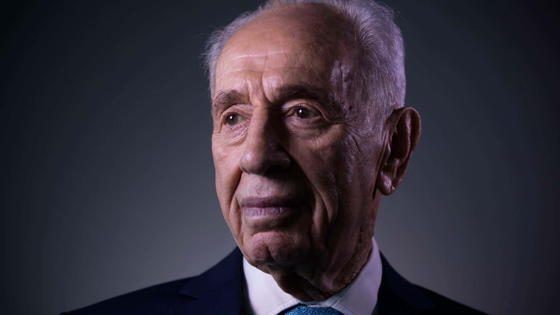 FILE - In this Monday, Feb. 8, 2016 file photo, Israel's former President Shimon Peres poses for a portrait at the Peres Center for Peace in Jaffa, Israel.