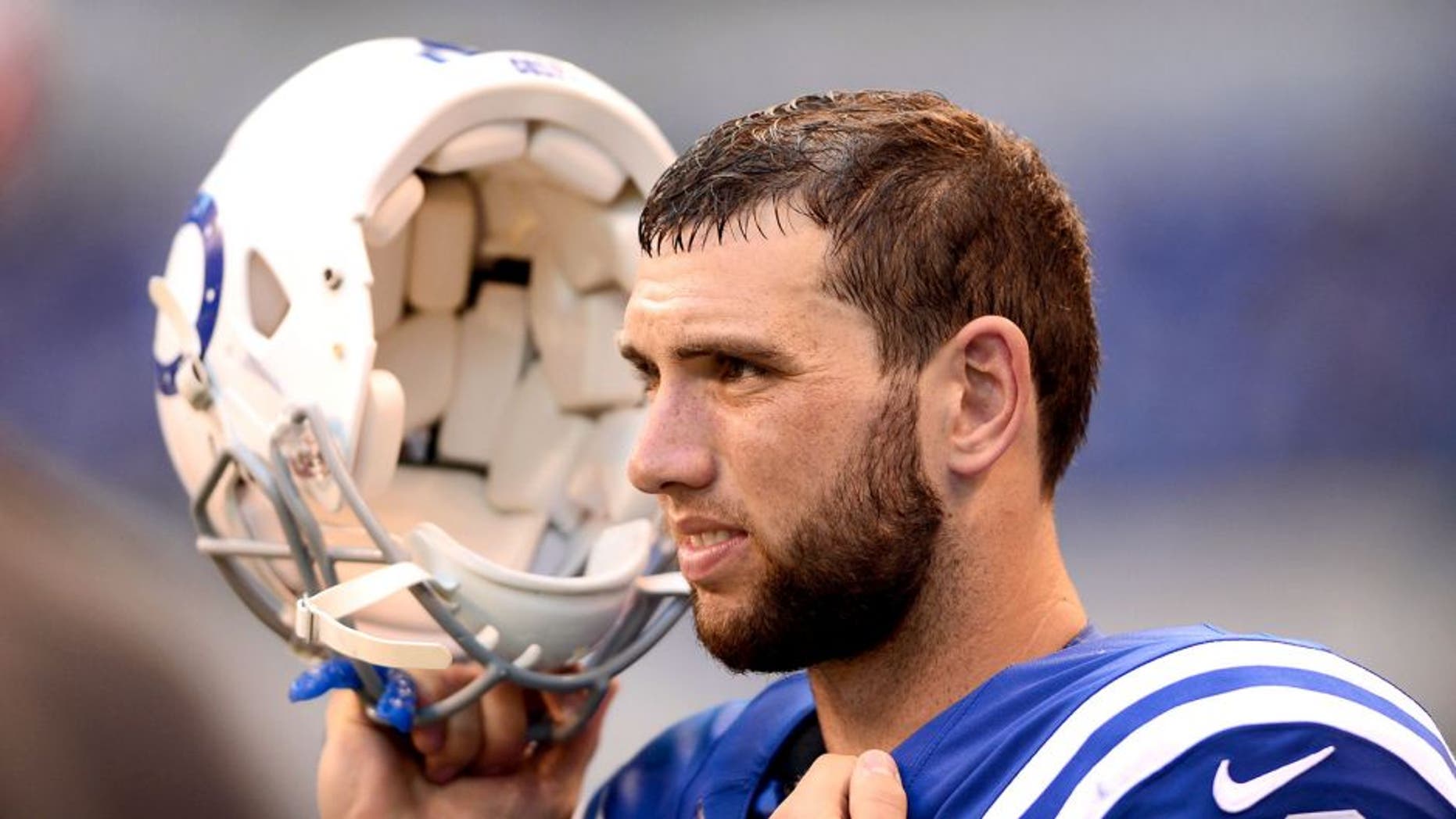 Sep 28, 2014; Indianapolis, IN, USA; Indianapolis Colts quarterback Andrew Luck (12) on the sidelines during the fourth quarter against the Tennessee Titans at Lucas Oil Stadium. Colts defeated the Titans 41-17. Mandatory Credit: Andrew Weber-USA TODAY Sports