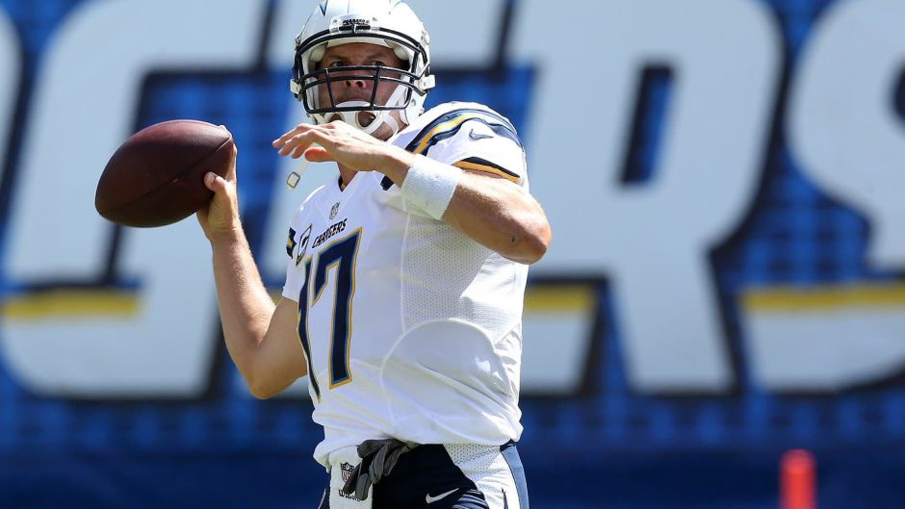 SAN DIEGO, CA - SEPTEMBER 28: Philip Rivers #17 of the San Diego Chargers throws the ball during warmups for the game with the Jacksonville Jaguars at Qualcomm Stadium on September 28, 2014 in San Diego, California. (Photo by Stephen Dunn/Getty Images)