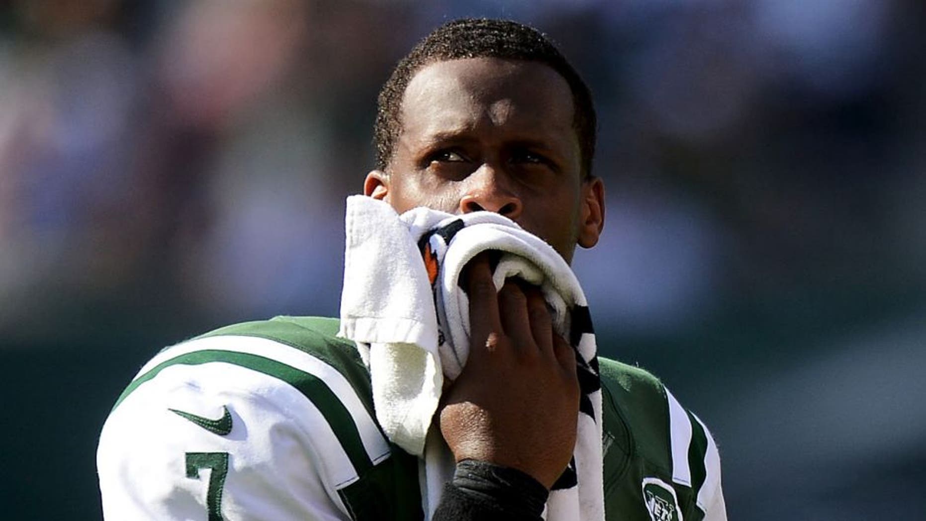 EAST RUTHERFORD, NJ - SEPTEMBER 28: Geno Smith #7 of the New York Jets looks on from the bench in the fourth quarter of their 24 to 17 loss to the Detroit Lions at MetLife Stadium on September 28, 2014 in East Rutherford, New Jersey. (Photo by Ron Antonelli/Getty Images)