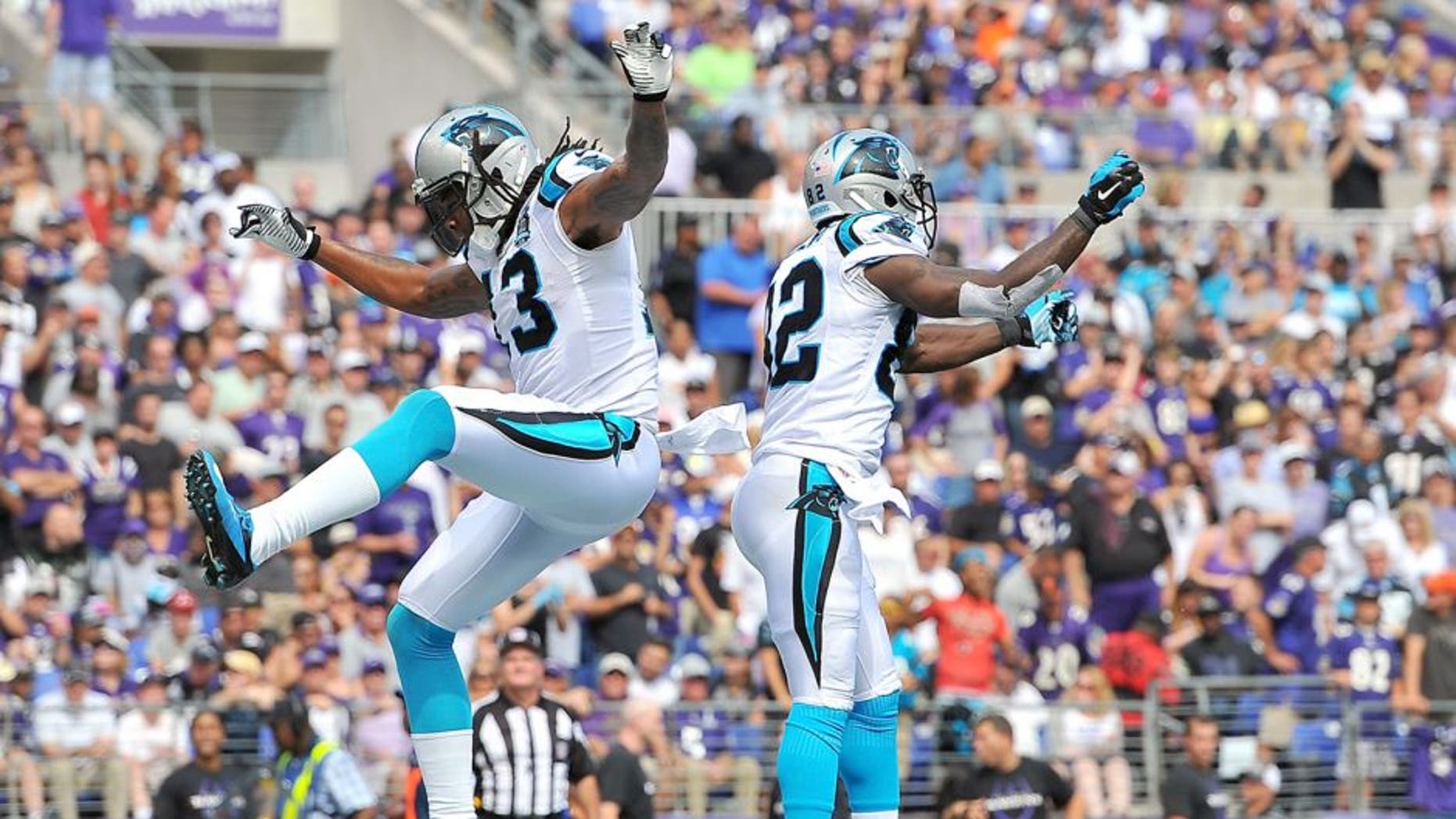 BALTIMORE, MD - SEPTEMBER 28: Wide receiver Kelvin Benjamin #13 of the Carolina Panthers celebrates with wide receiver Jerricho Cotchery #82 of the Carolina Panthers after scoring a touchdown in the second hafl of a game against the Baltimore Ravens at M&T Bank Stadium on September 28, 2014 in Baltimore, Maryland. (Photo by Larry French/Getty Images)