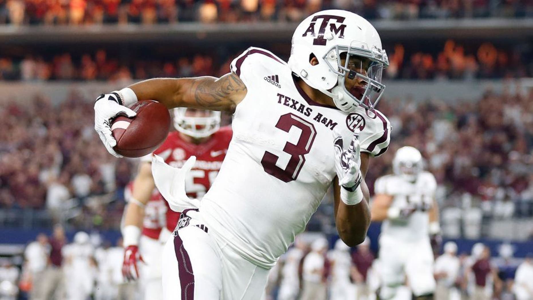 Sep 26, 2015; Arlington, TX, USA; Texas A&M Aggies receiver Christian Kirk (3) runs after a reception in the second quarter against the Arkansas Razorbacks at AT&T Stadium. Mandatory Credit: Matthew Emmons-USA TODAY Sports