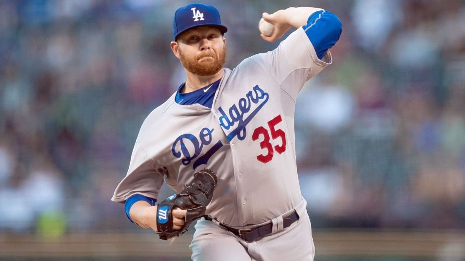 DENVER, CO - SEPTEMBER 26: Brett Anderson #35 of the Los Angeles Dodgers pitches against the Colorado Rockies in the first inning of a game at Coors Field on September 26, 2015 in Denver, Colorado. (Photo by Dustin Bradford/Getty Images)