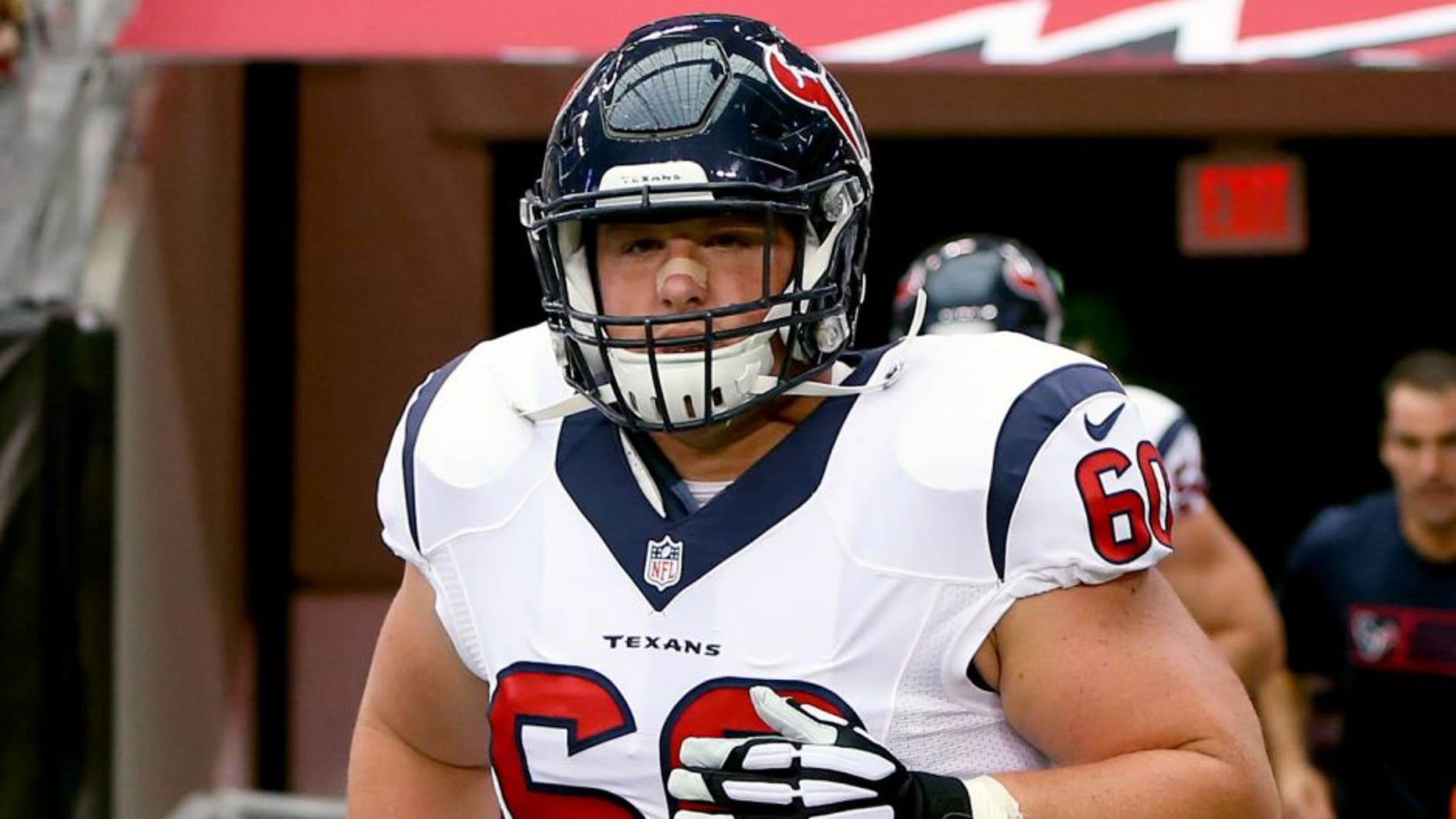 Aug 9, 2014; Glendale, AZ, USA; Houston Texans center Ben Jones (60) against the Arizona Cardinals during a preseason game at University of Phoenix Stadium. Mandatory Credit: Mark J. Rebilas-USA TODAY Sports