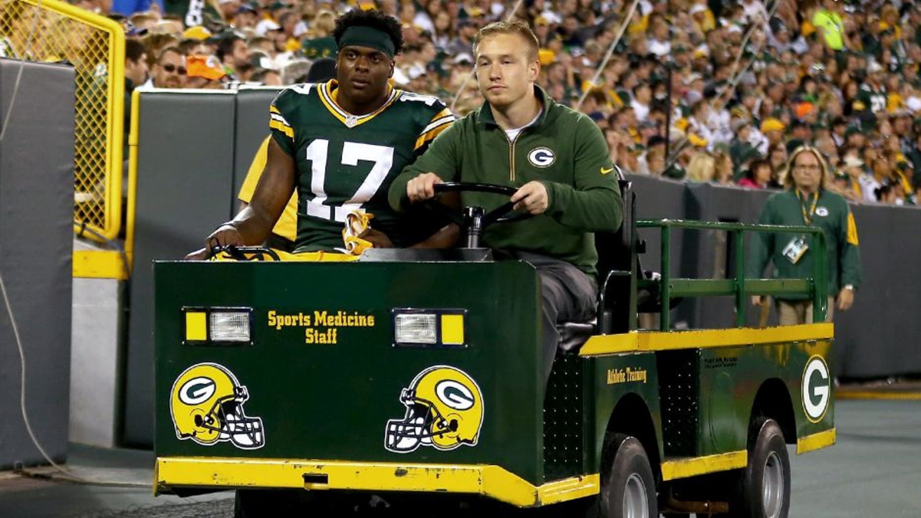 GREEN BAY, WI - SEPTEMBER 20: Davante Adams #17 of the Green Bay Packers is assisted off the field after a play against the Seattle Seahawks during their game at Lambeau Field on September 20, 2015 in Green Bay, Wisconsin. (Photo by Maddie Meyer/Getty Images)