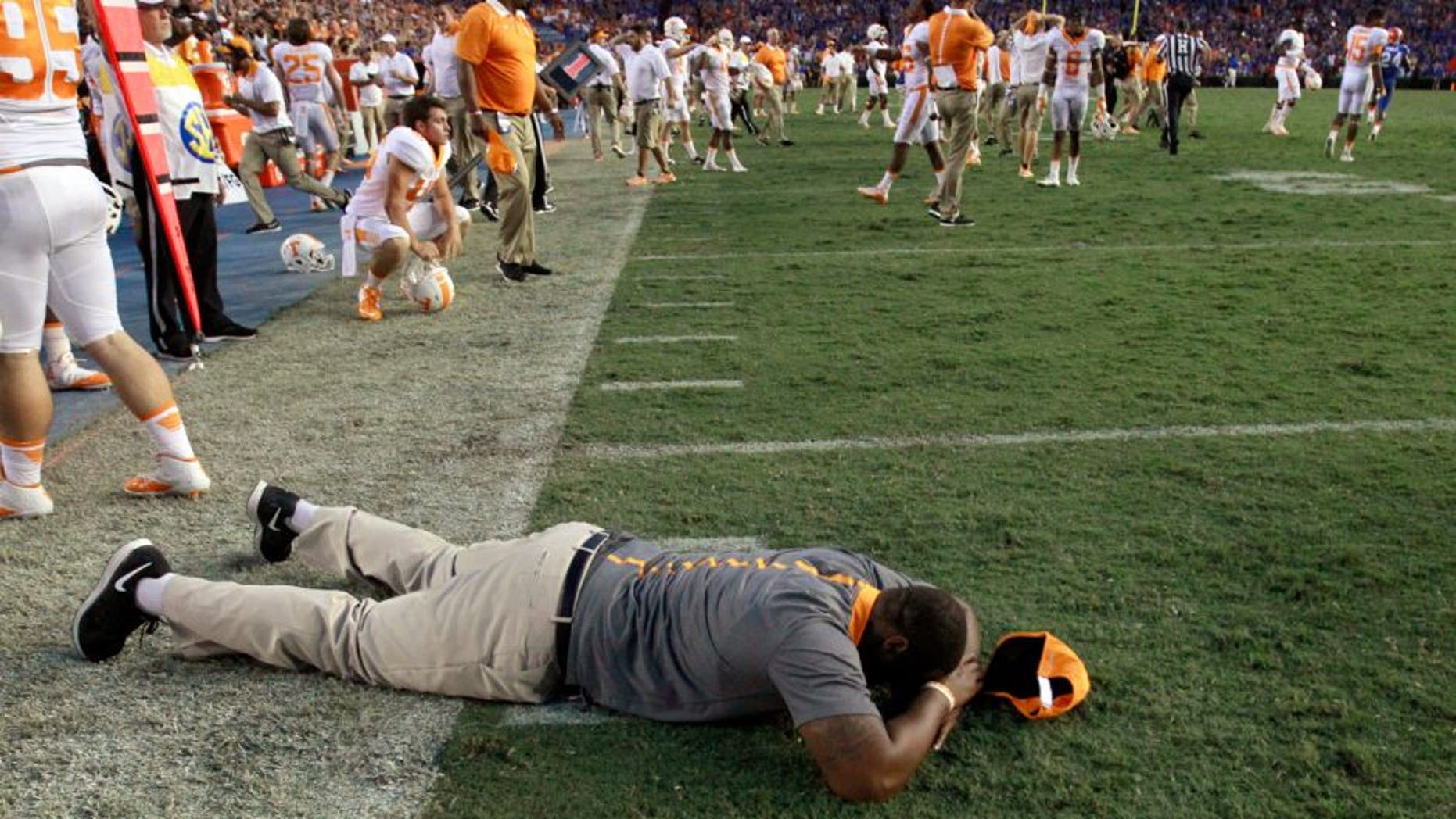 Sep 26, 2015; Gainesville, FL, USA; Tennessee Volunteers coach and players react as they lost to the Florida Gators at Ben Hill Griffin Stadium. Florida Gators defeated the Tennessee Volunteers 28-27. Mandatory Credit: Kim Klement-USA TODAY Sports
