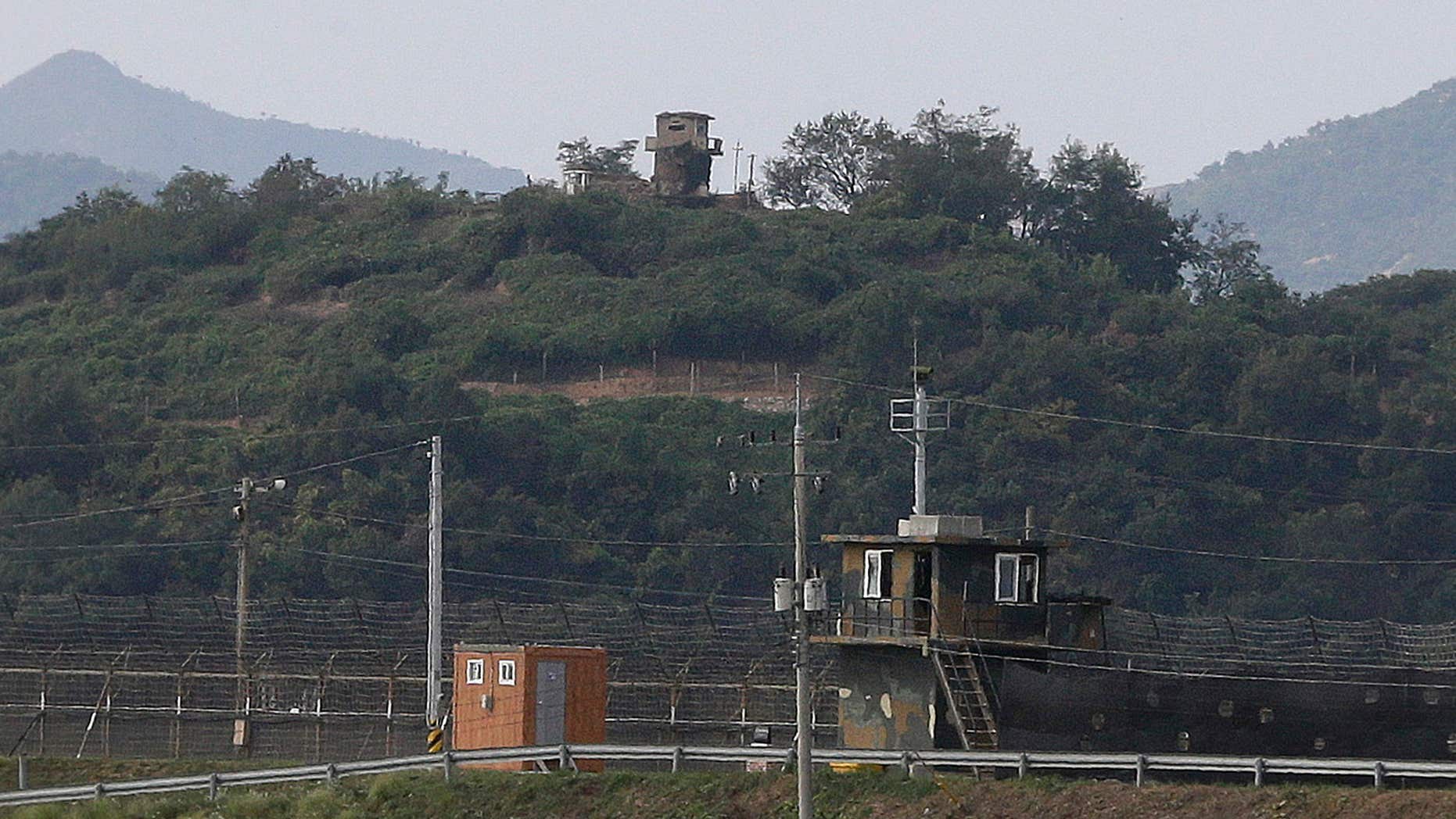 Sept. 29, 2016: Military guard posts of North Korea, rear, and South Korea, bottom, are seen in Paju, at the border with North Korea, South Korea.