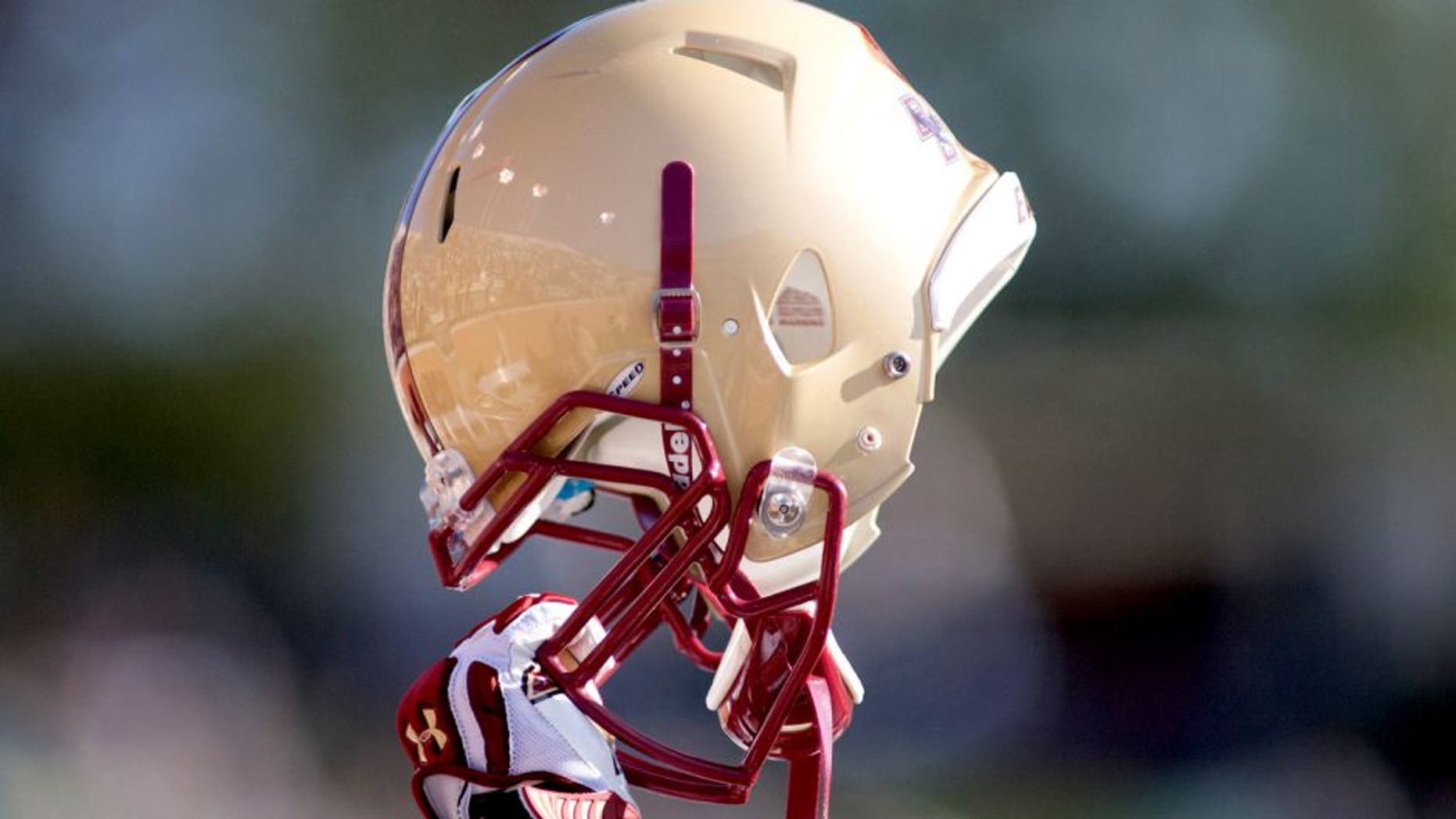 Nov 3, 2012; Winston Salem, NC, USA; A Boston College Eagles player raises his helmet during kickoff in the first quarter against the Wake Forest Demon Deacons at BB&T field. Mandatory Credit: Jeremy Brevard-USA TODAY Sports