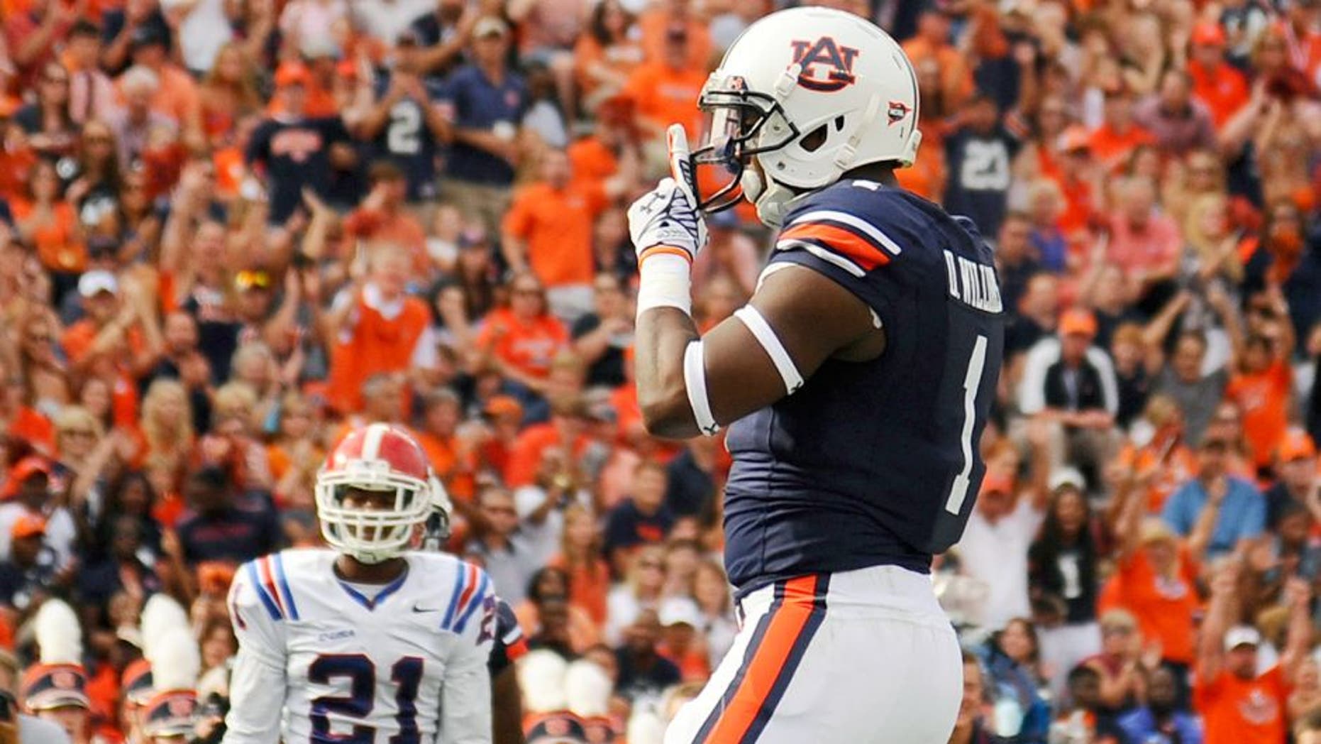 Sep 27, 2014; Auburn, AL, USA; Auburn Tigers wide receiver D'haquille Williams (1) celebrates a touchdown during the first half against the Louisiana Tech Bulldogs at Jordan Hare Stadium. Mandatory Credit: Shanna Lockwood-USA TODAY Sports