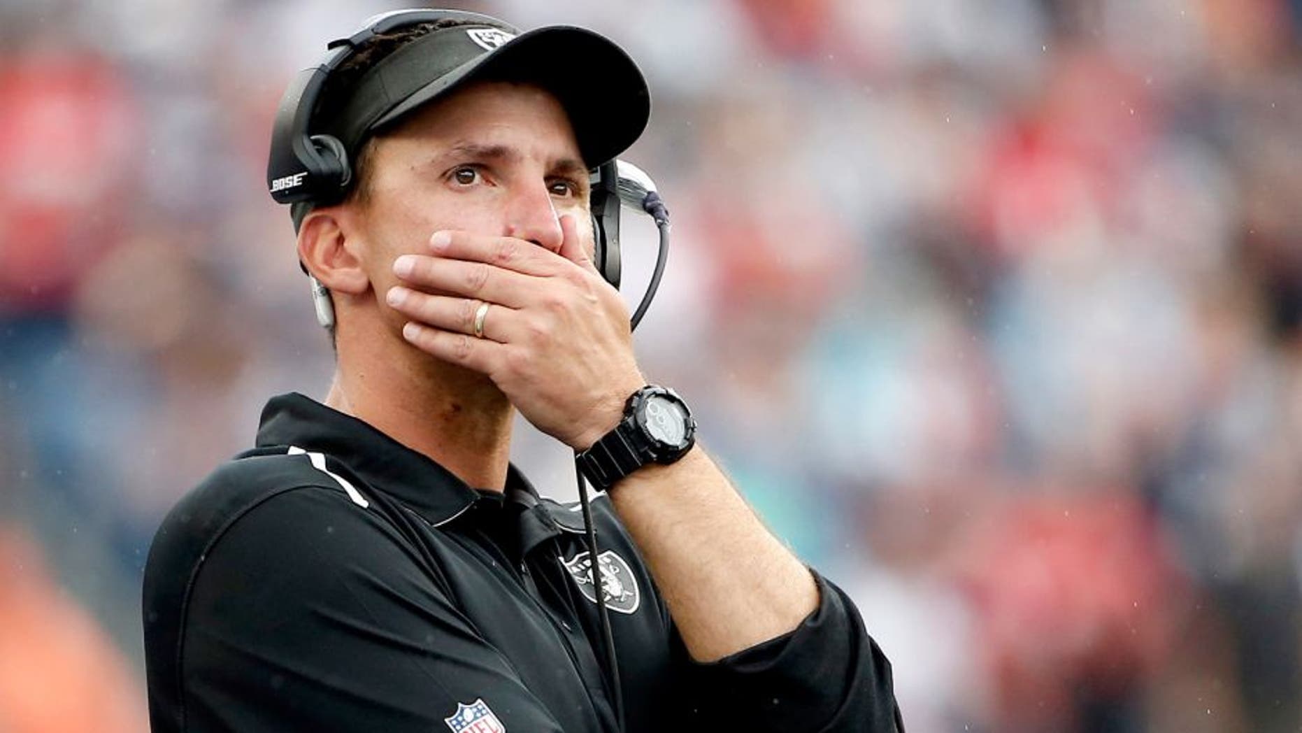 Sep 21, 2014; Foxborough, MA, USA; Oakland Raiders head coach Dennis Allen looks on during the final moments of their 16-9 loss to the New England Patriots at Gillette Stadium. Mandatory Credit: Winslow Townson-USA TODAY Sports